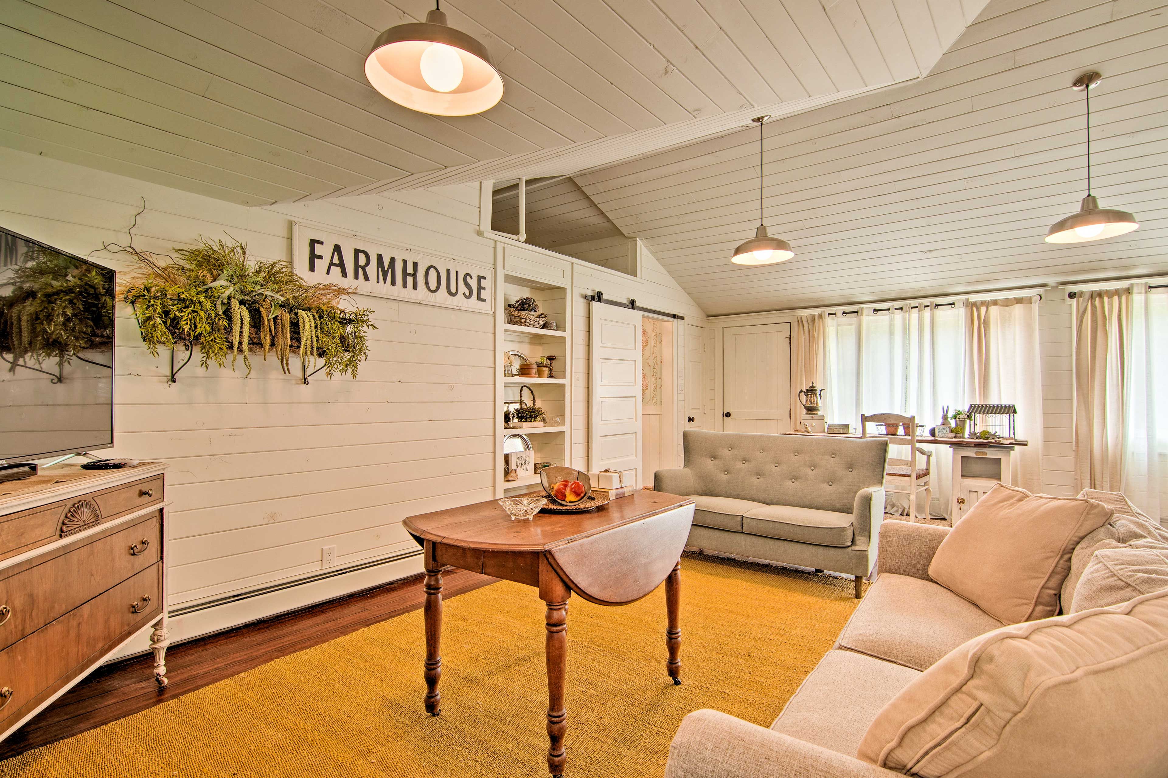 Relax on the sofa and watch a show on the flat-screen TV.