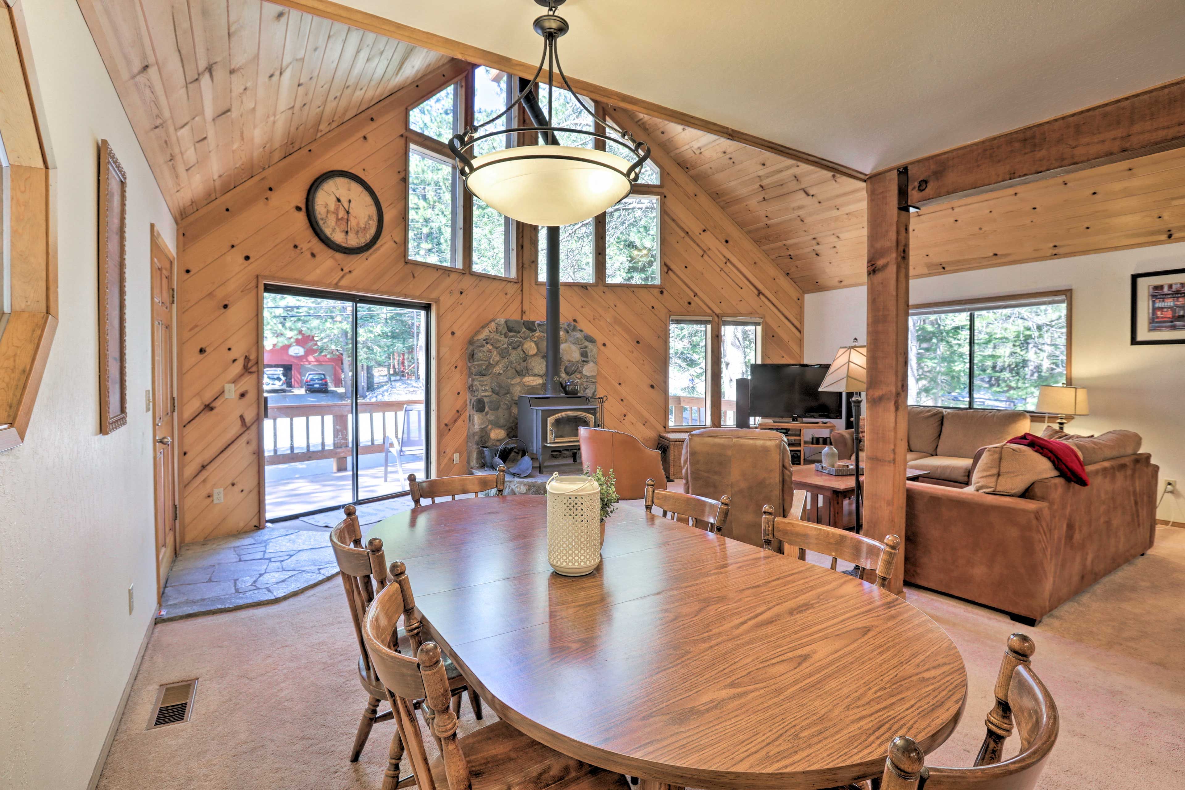 Cozy up by the wood-burning stove then head to the dining table for dinner.