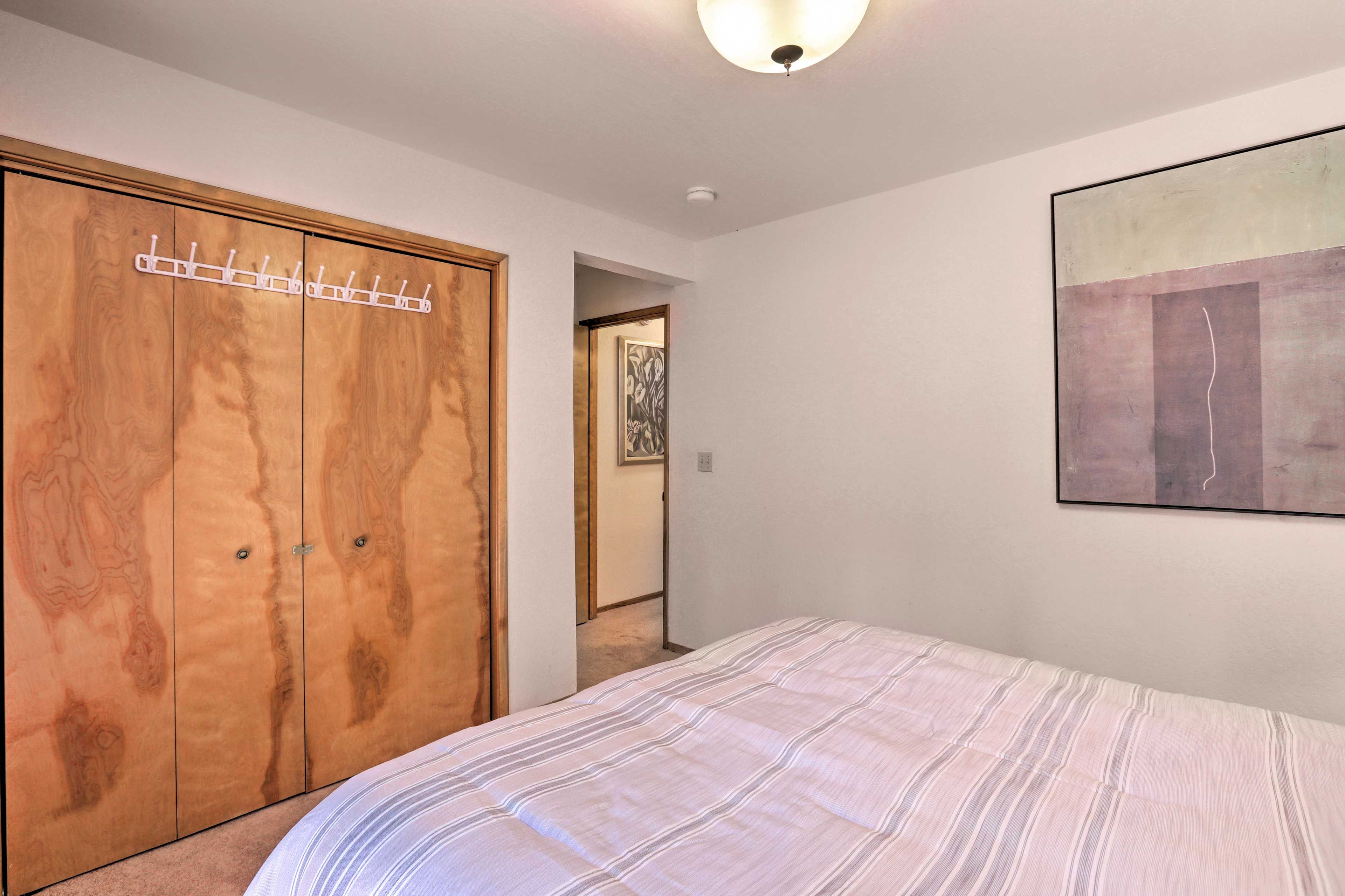 This bedroom offers deck access.