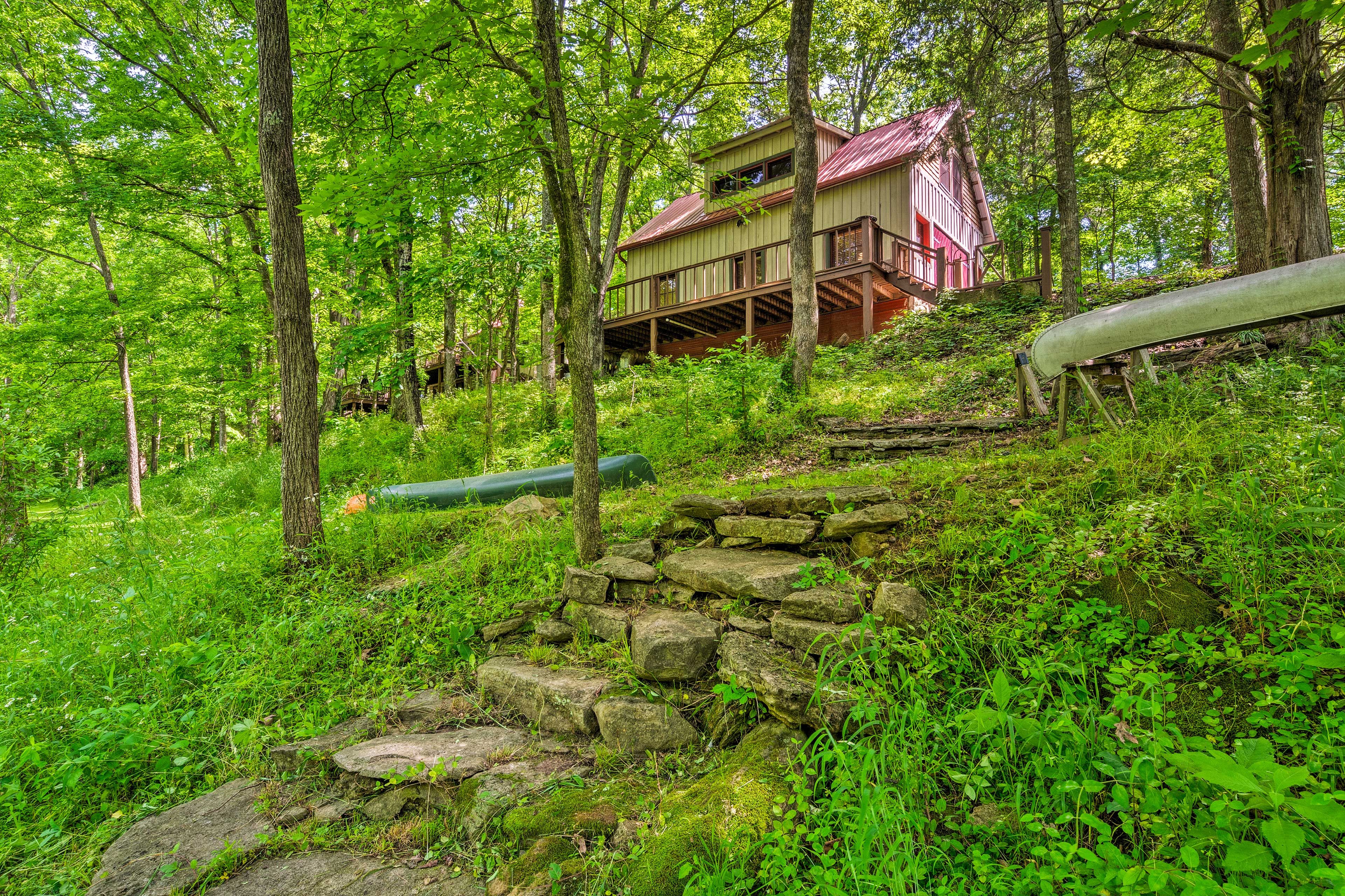 Head down the stone steps to access the creek.