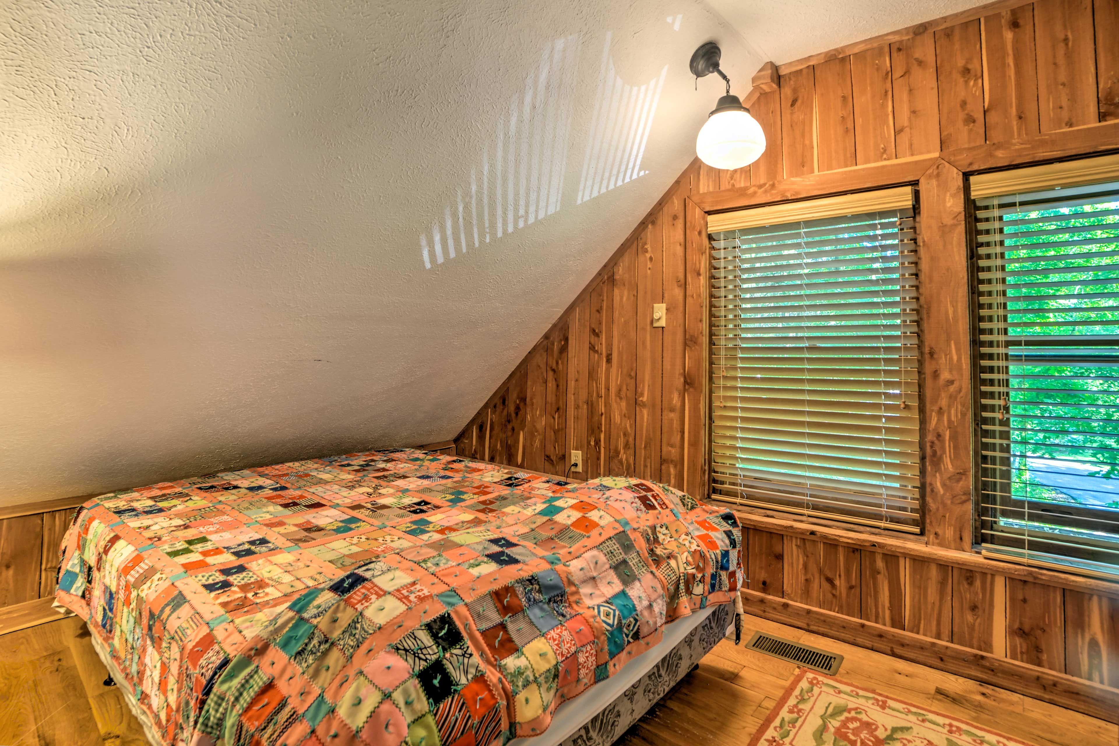 Two guests can share the comfort of this queen-sized bed.