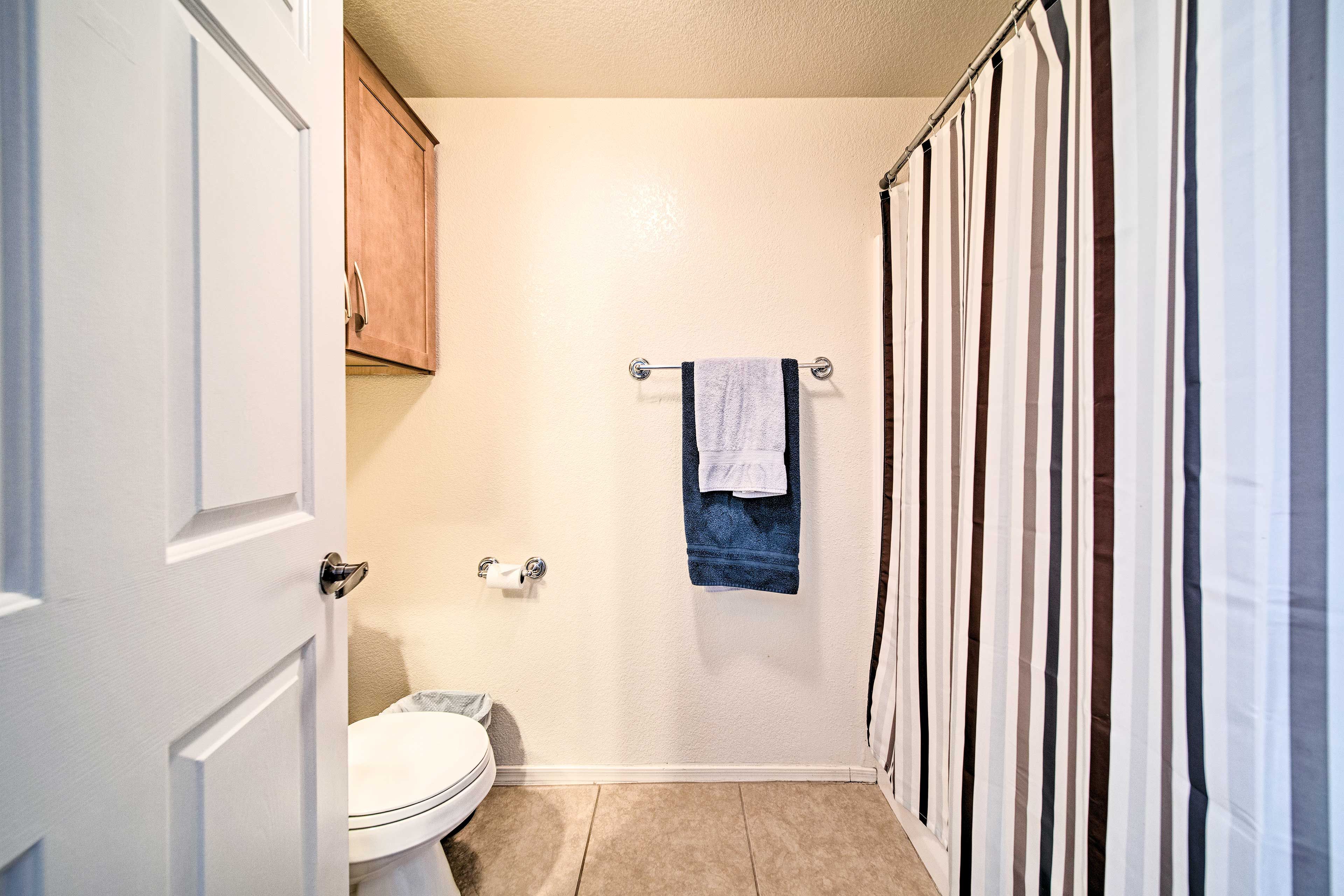 Rinse away the day in this full bathroom.