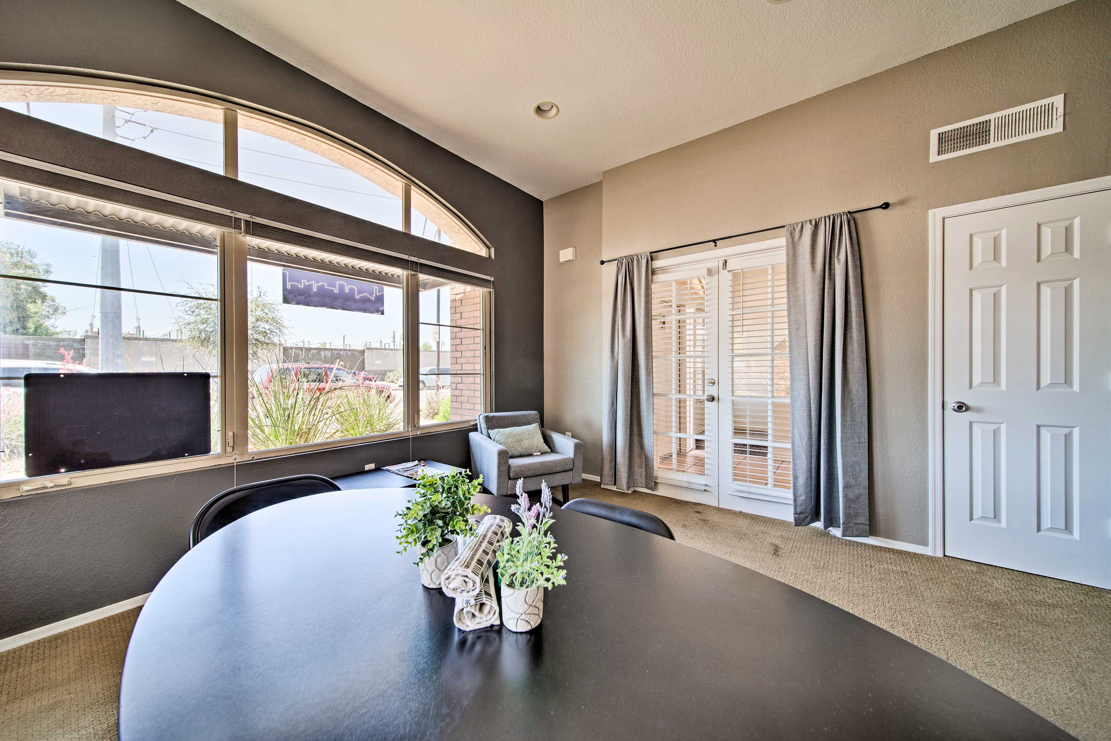 The apartment has a calming grey interior.