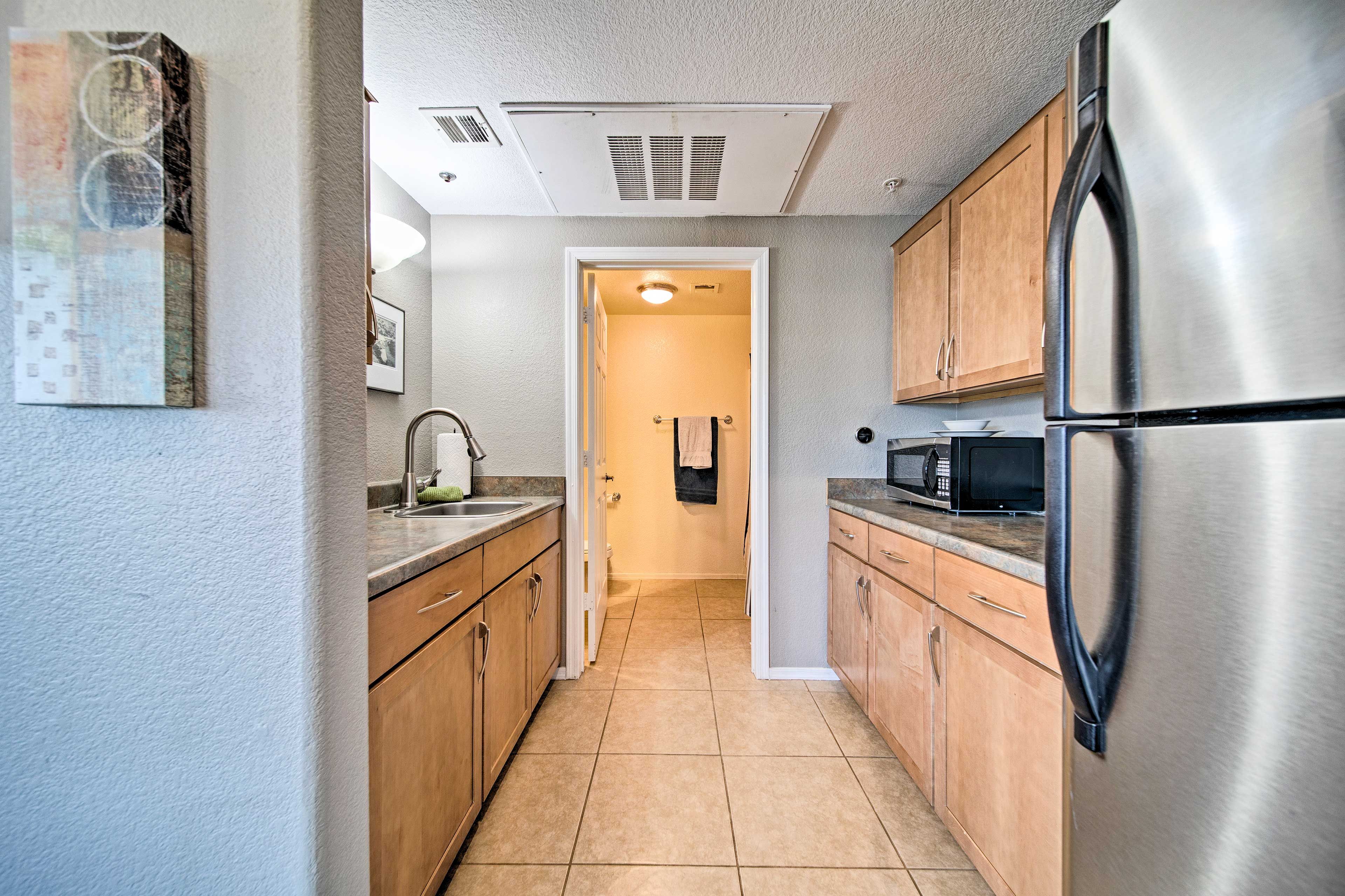 You'll find a hot plate, microwave and plenty of cooking utensils inside.