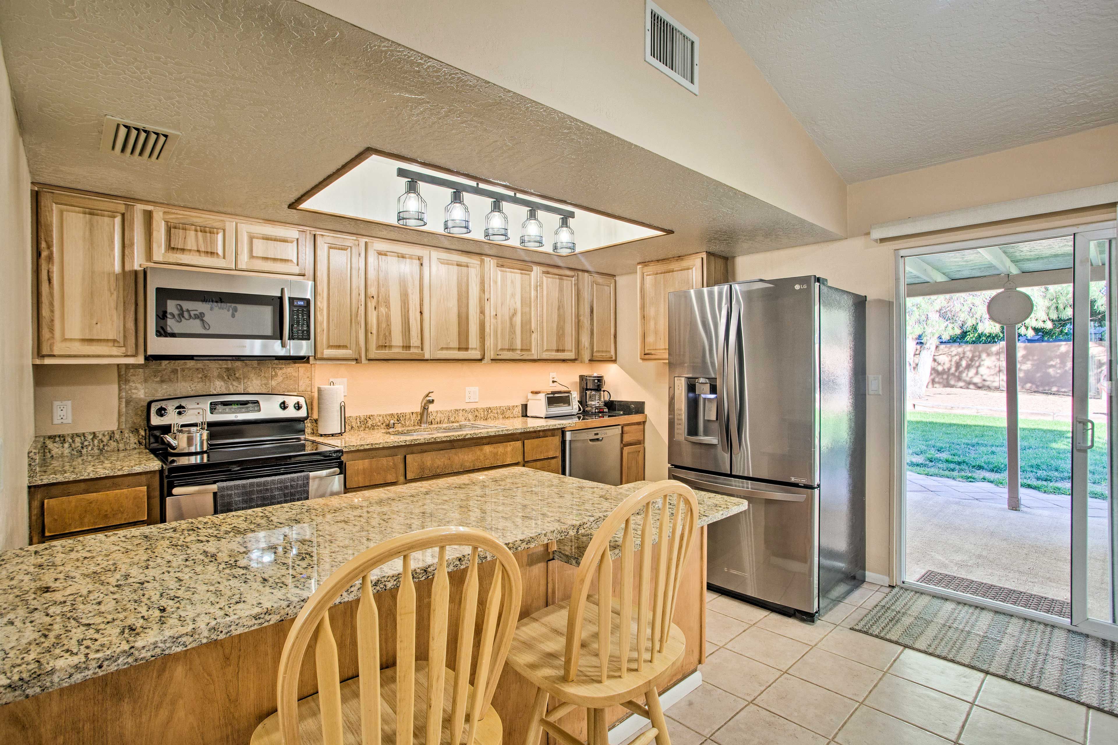 Prepare your favorite recipes in the fully equipped kitchen.