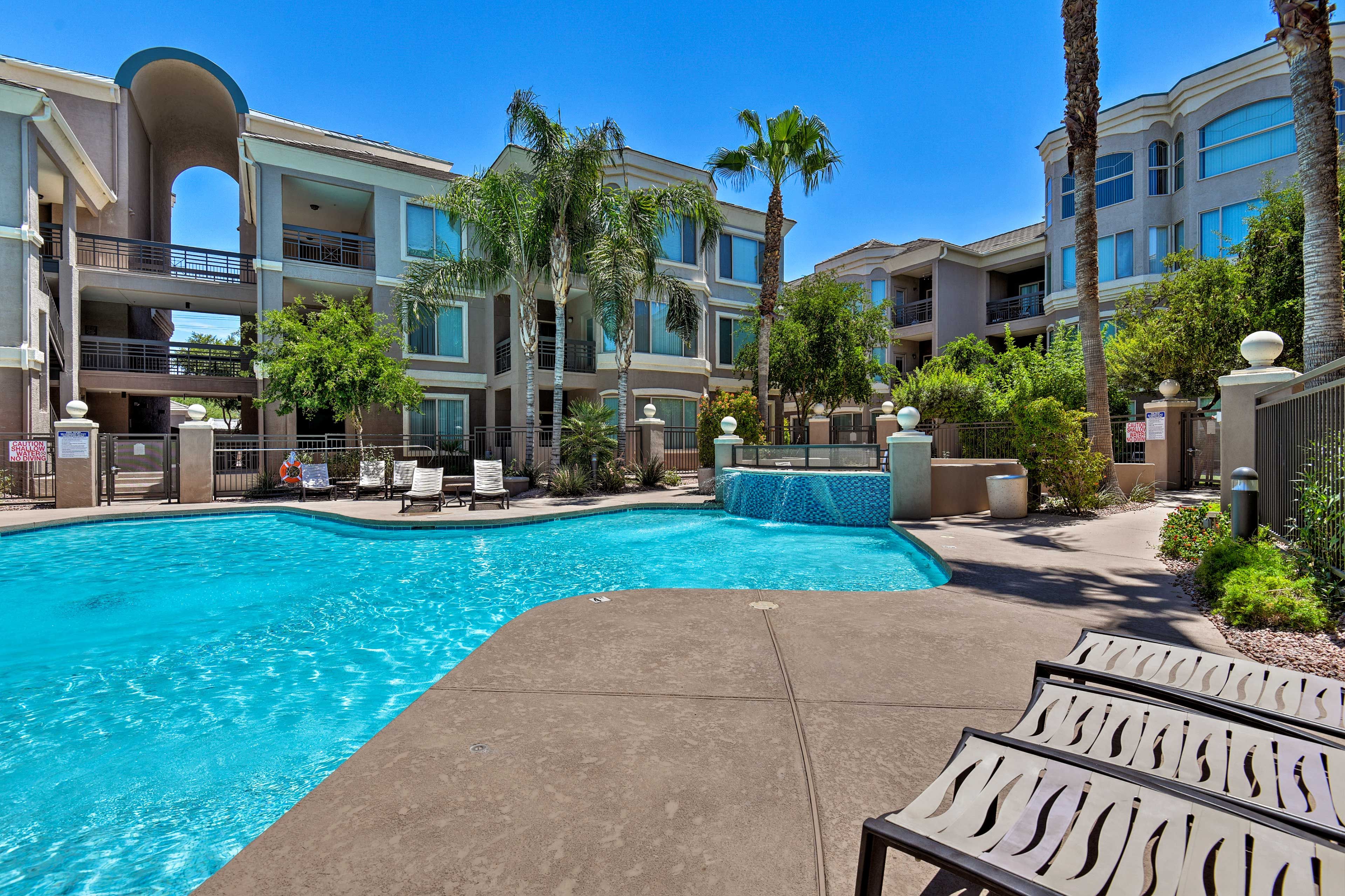 Work on your tan next to the community pool.