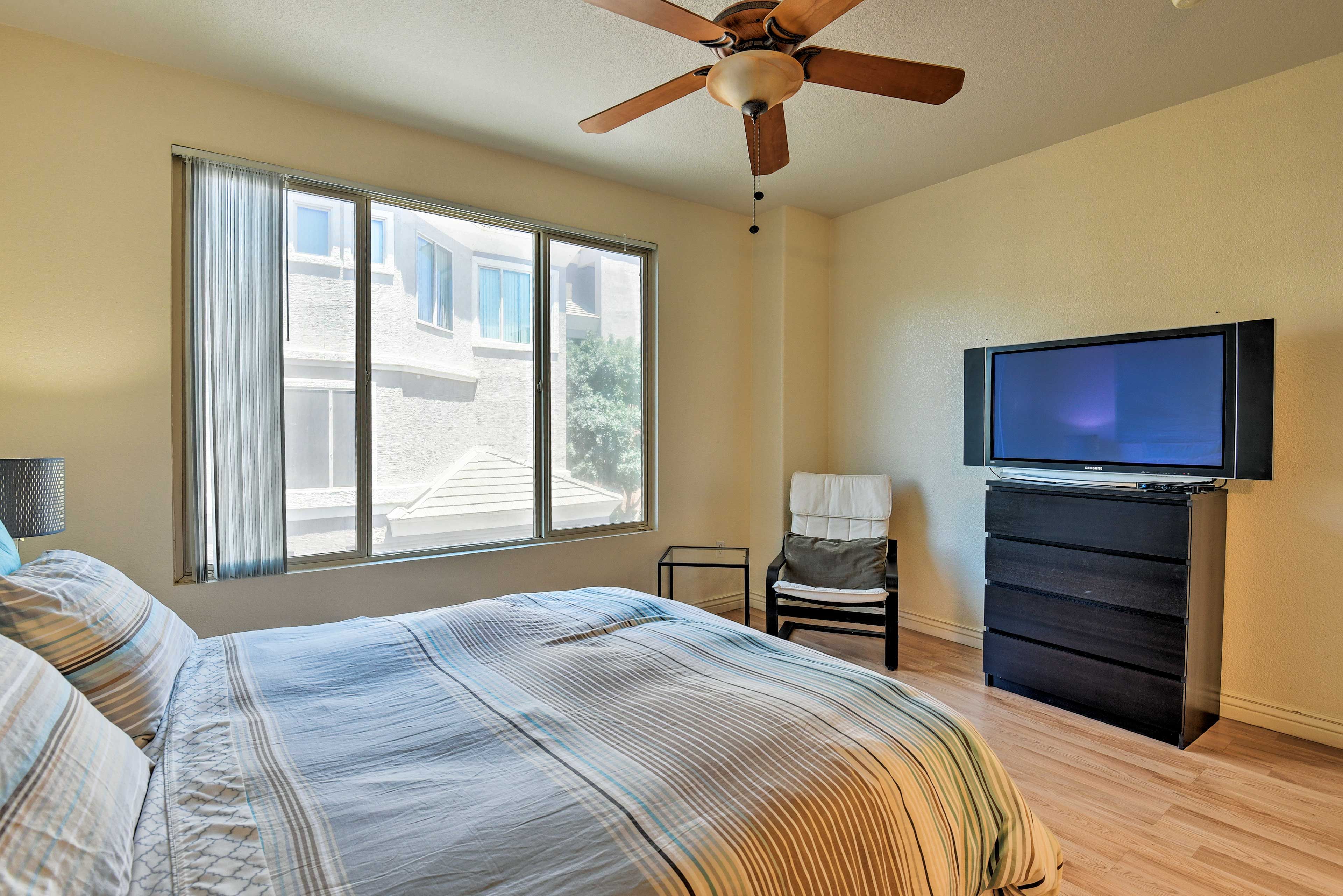 Drift to sleep while watching your favorite shows on the flat-screen cable TV.