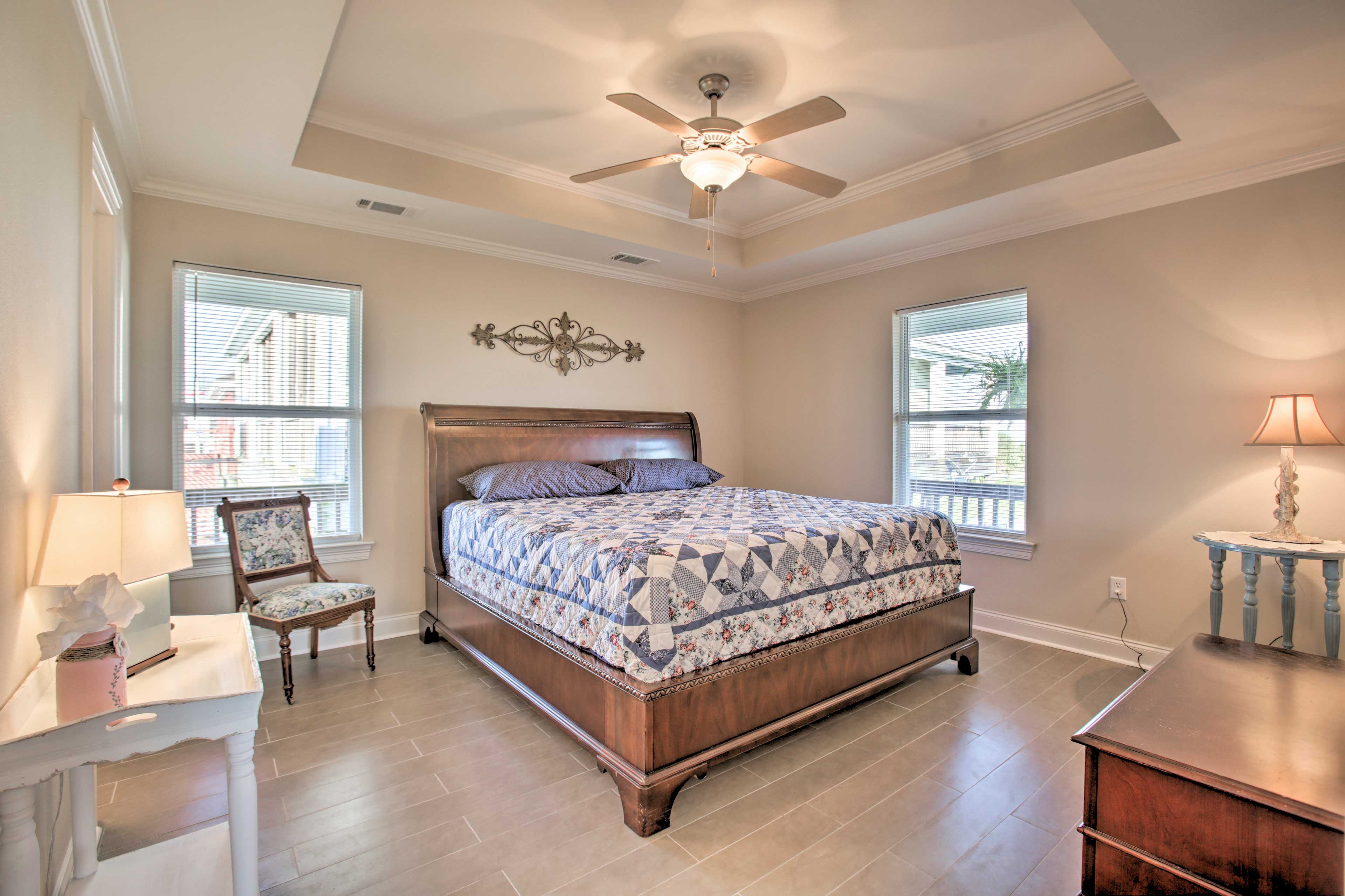 Two lucky guests can claim the king bed in this bedroom.