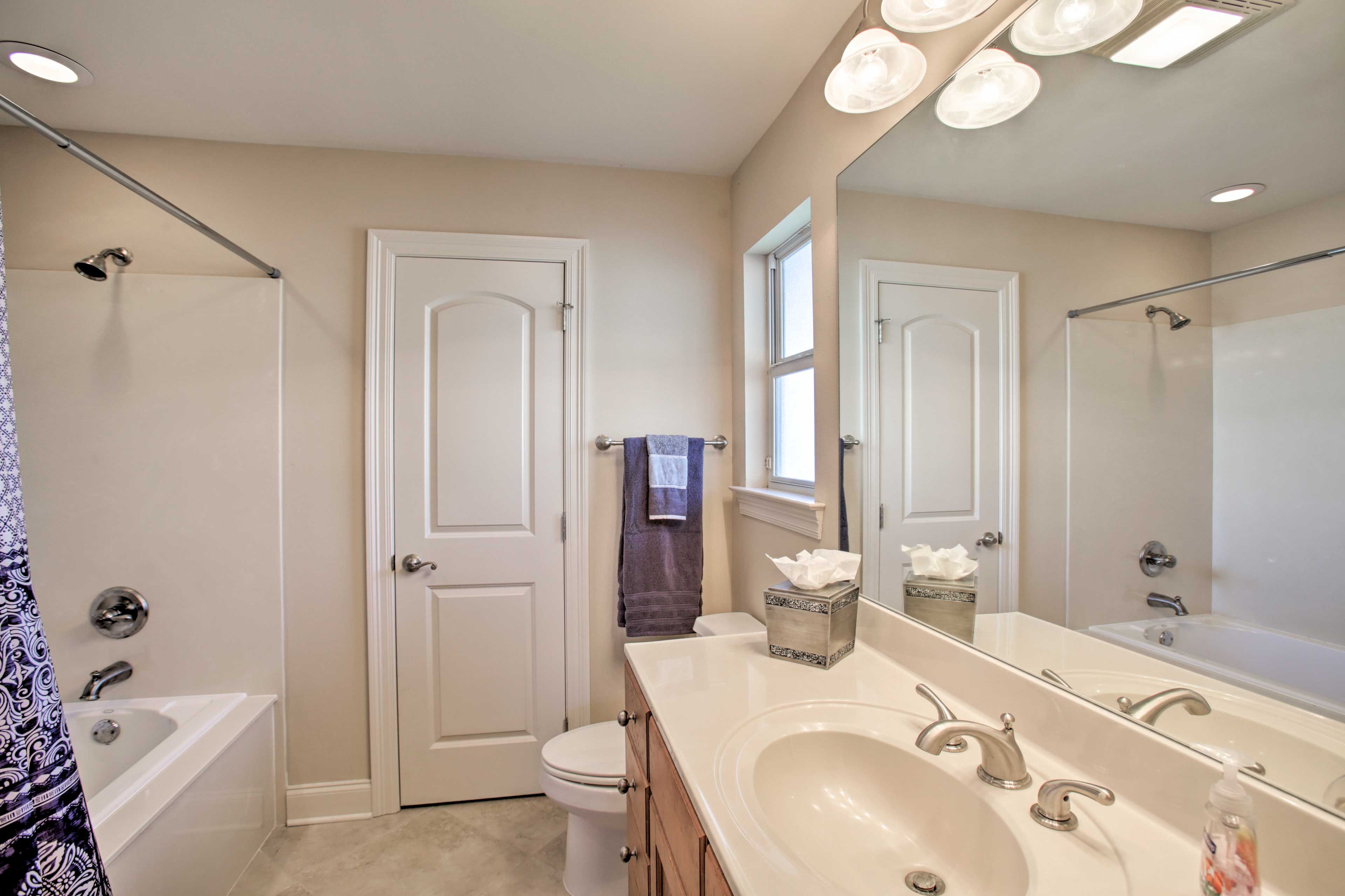 Hop in the shower/tub combo to rinse off before bed!