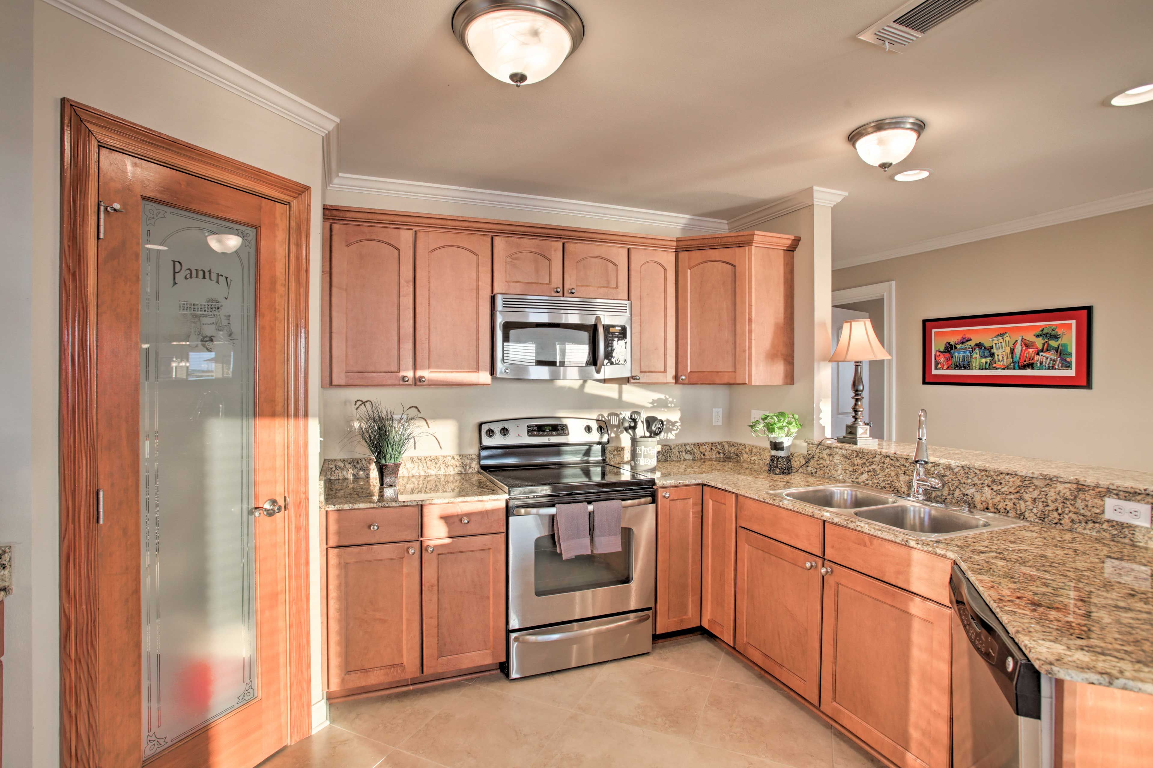 The kitchen comes fully equipped with stainless steel appliances.