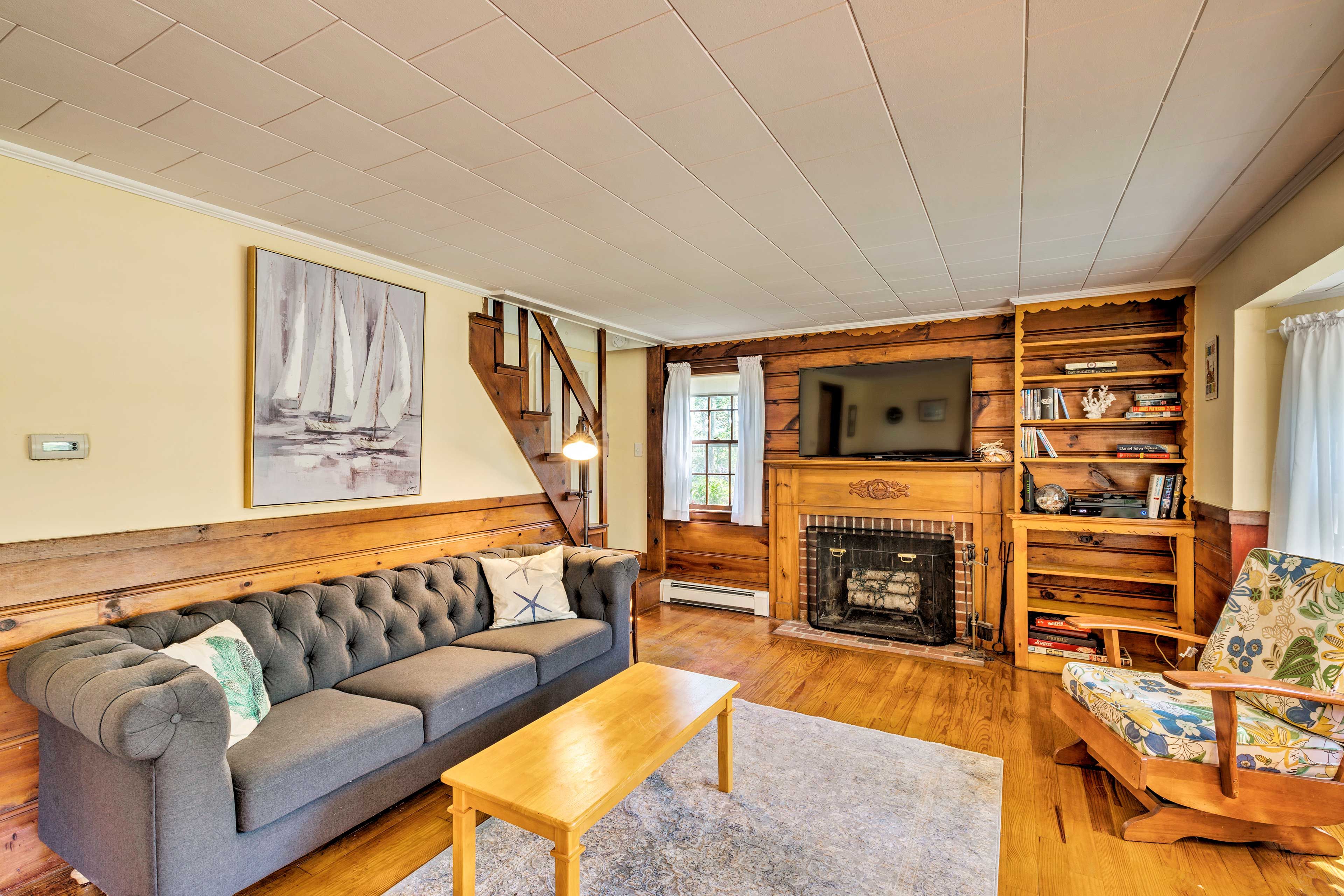 Watch movies on the flat-screen cable TV.