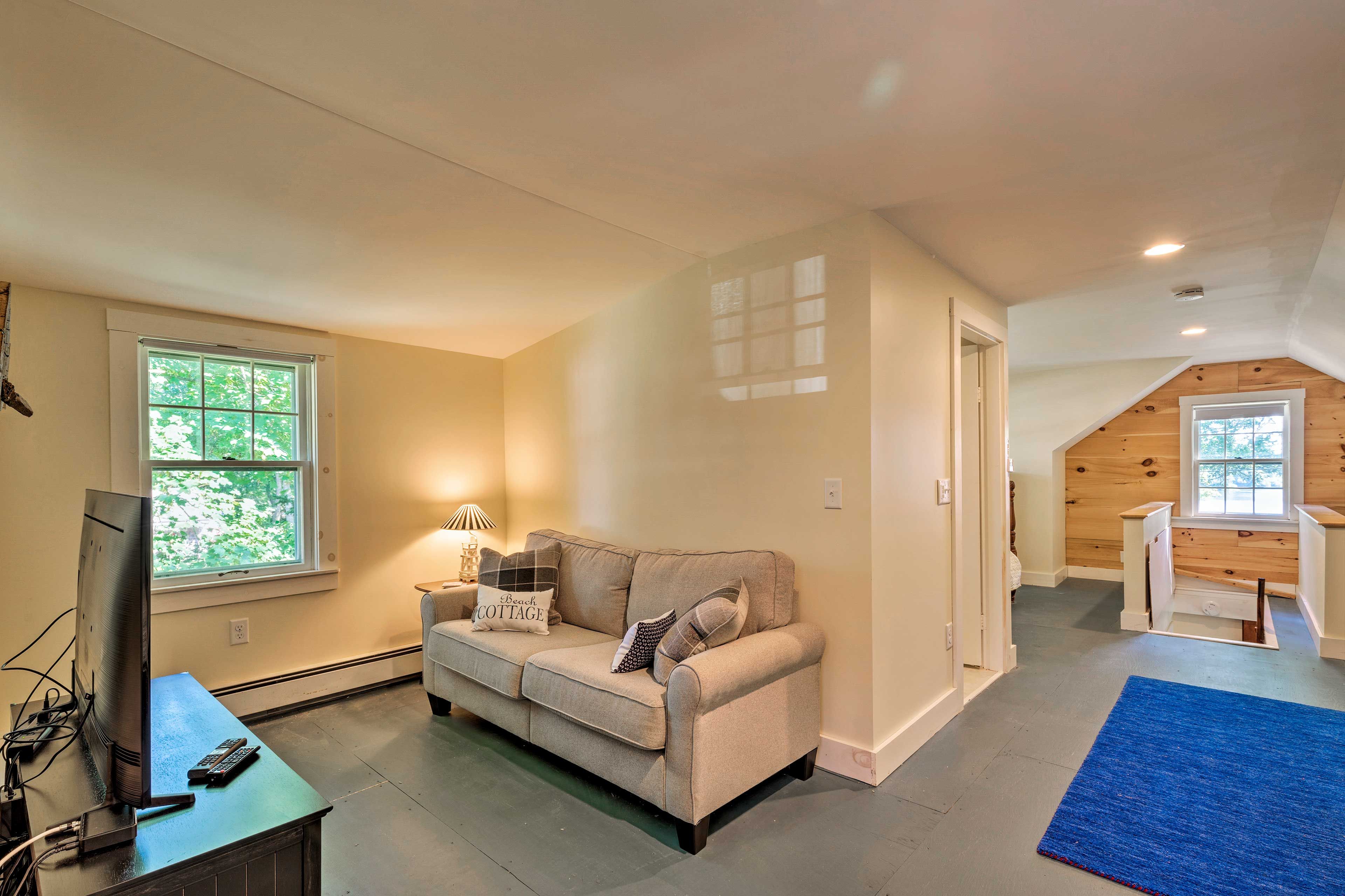 Hang out together in this upstairs bedroom.