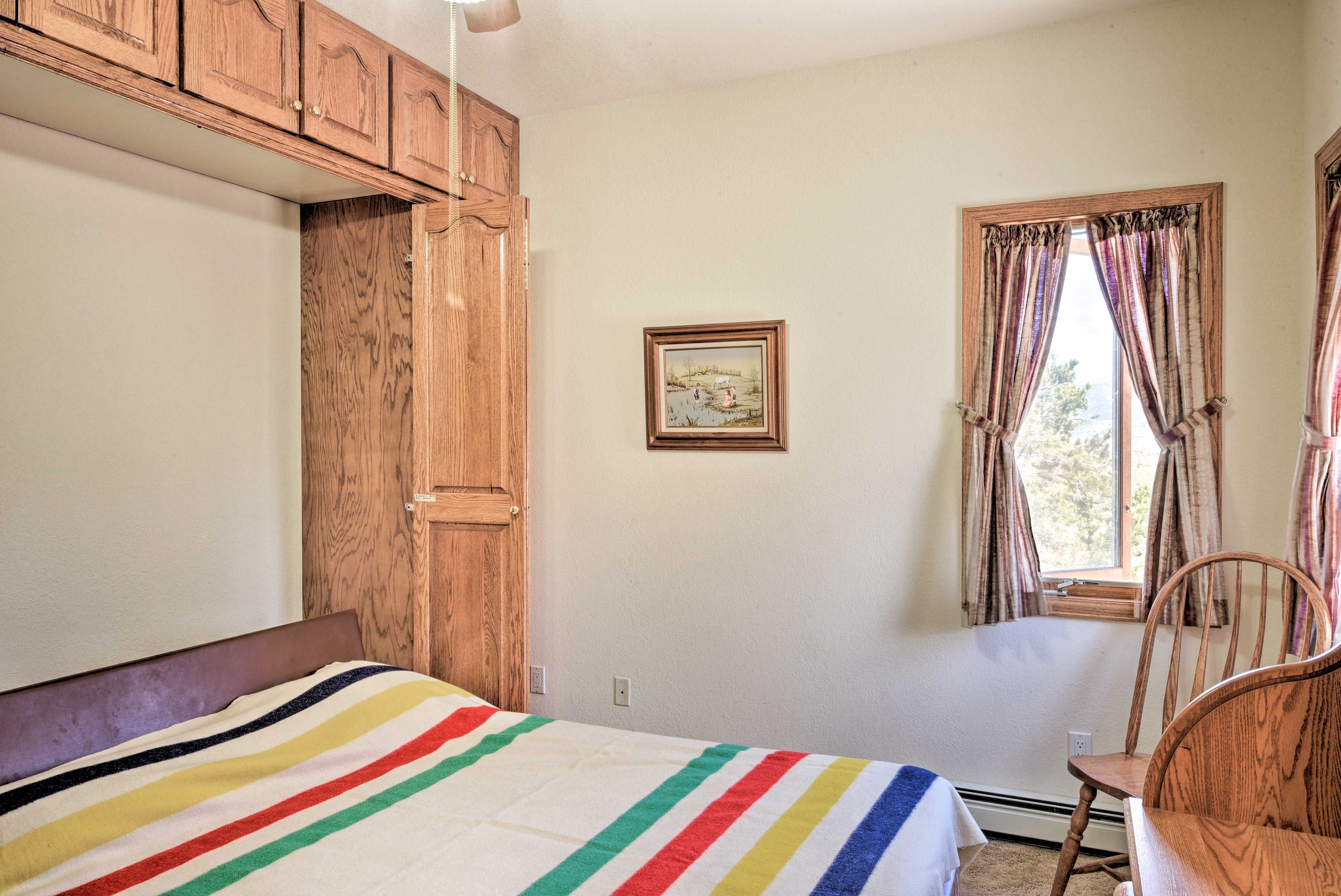 This room features a queen-sized Murphy bed.