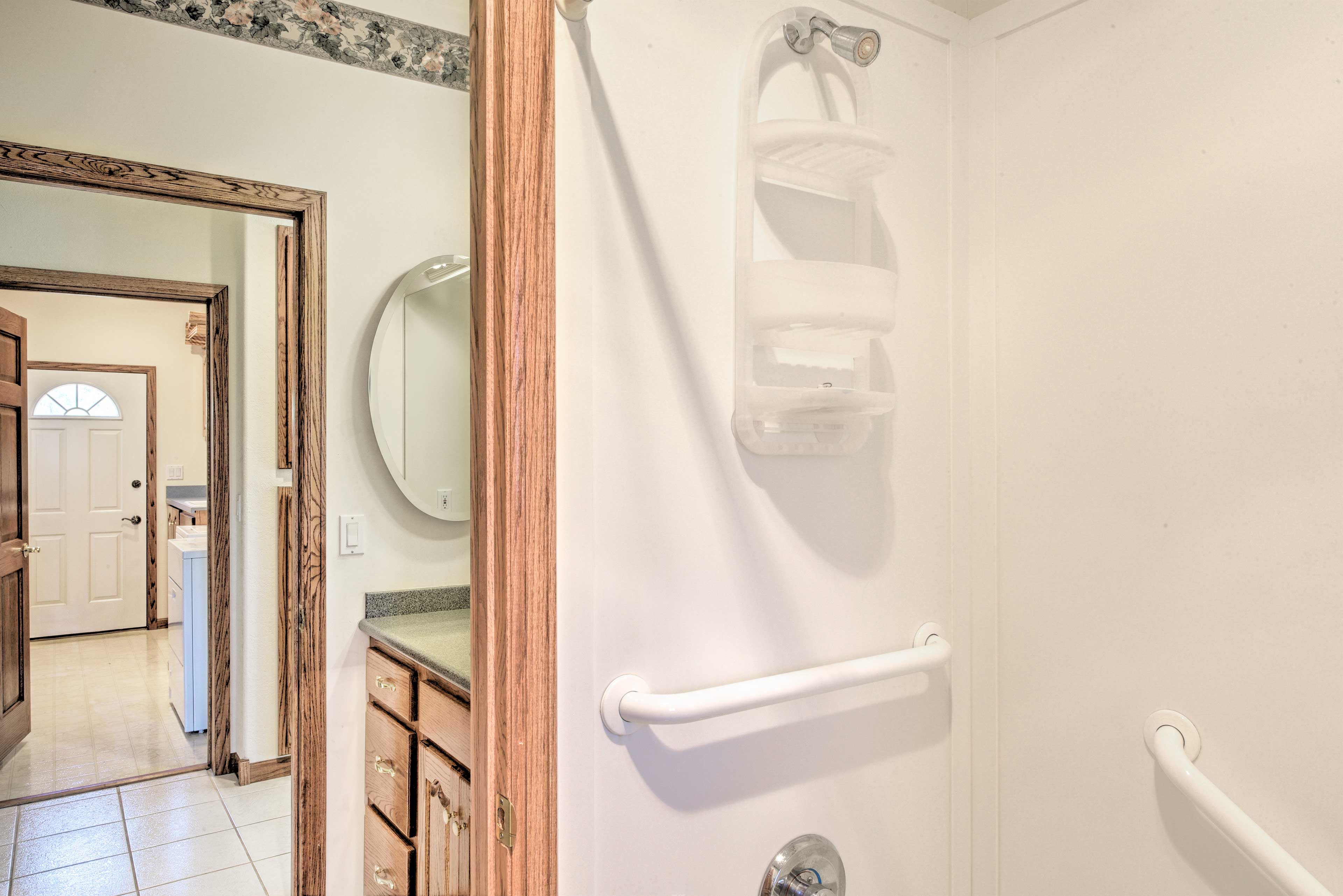 The showers feature grab rails.