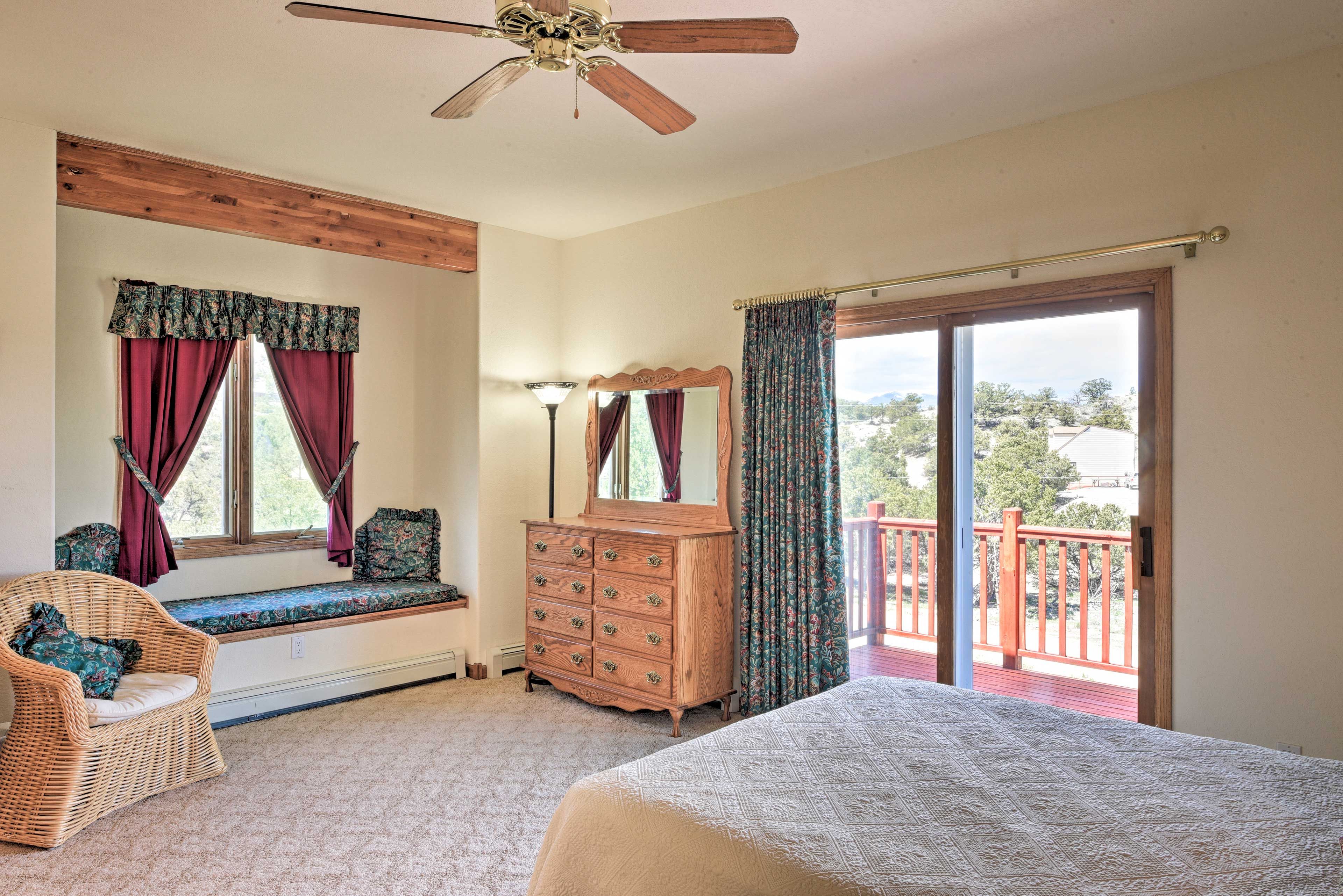 A window seat and private deck complete the room.