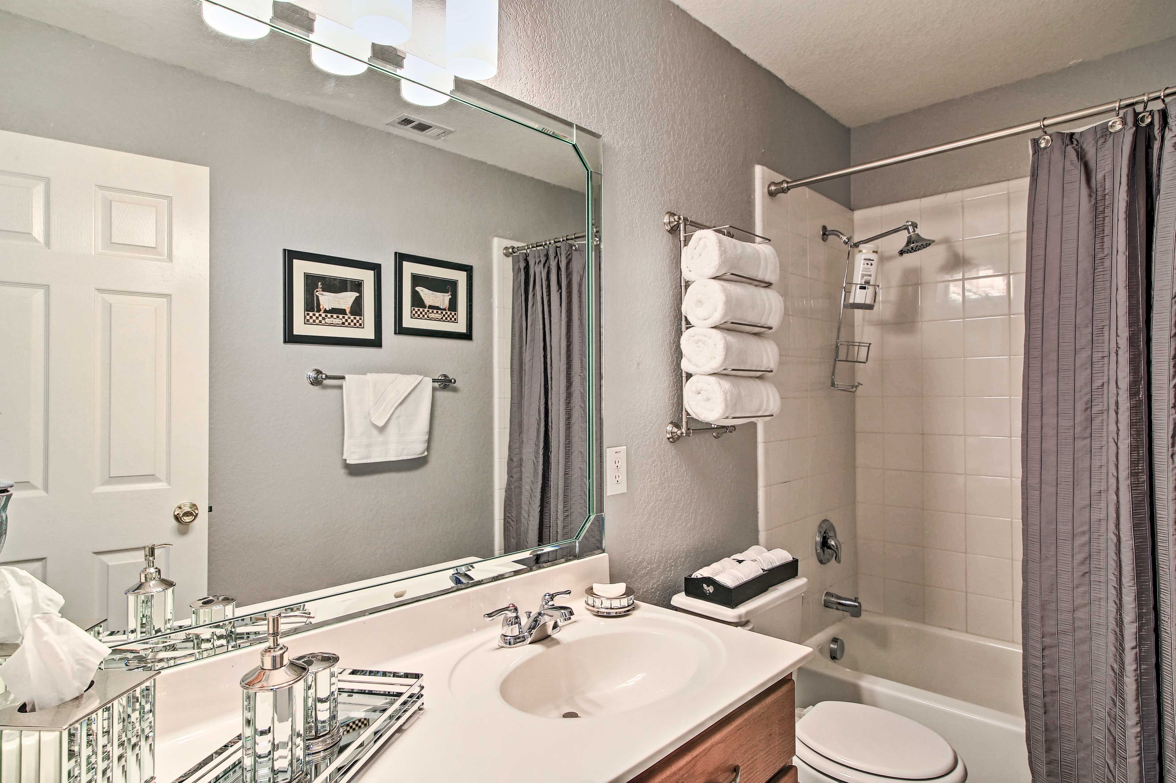 Rinse off the day in the shower/tub combo.