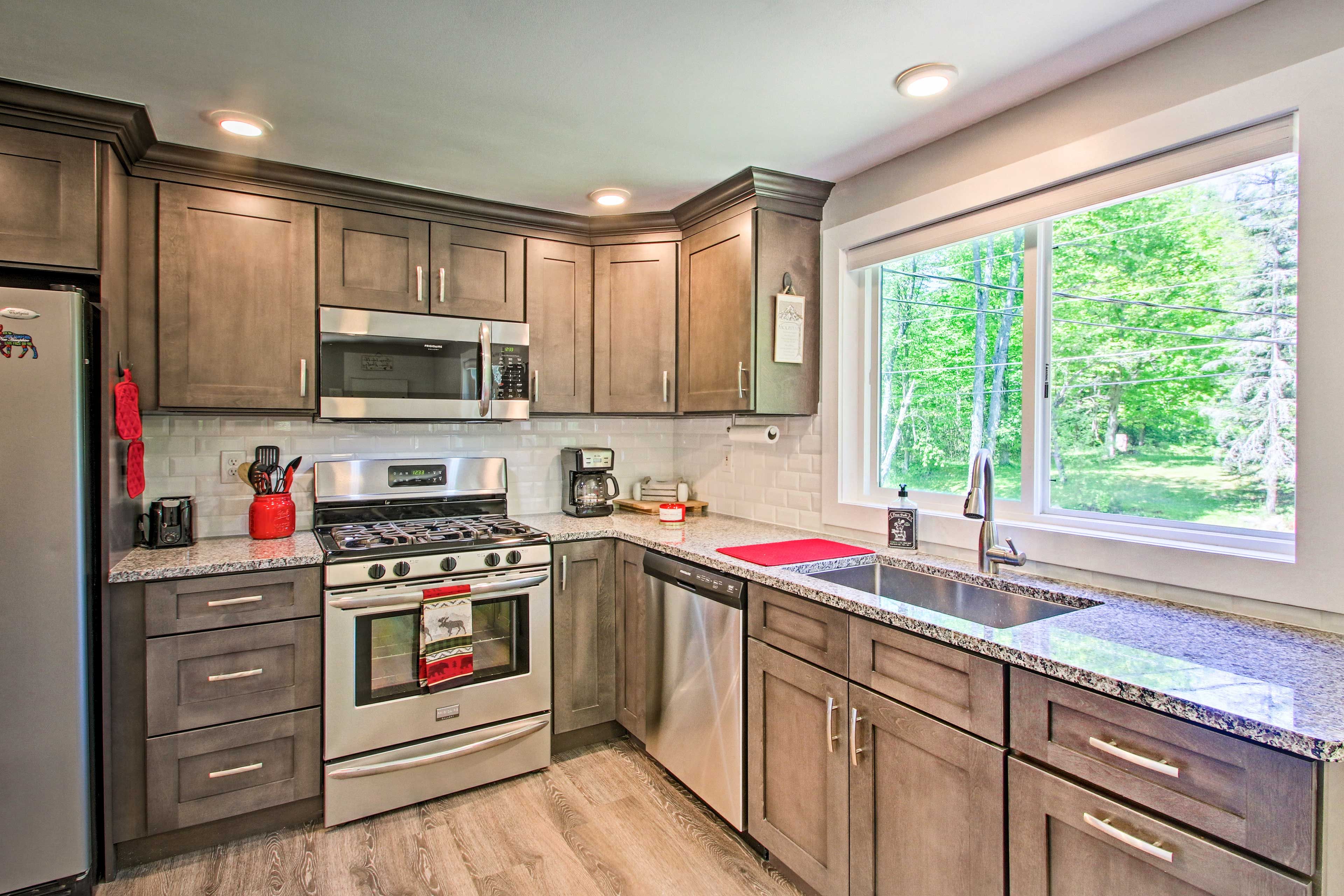 Stainless steel appliances elevate the kitchen.