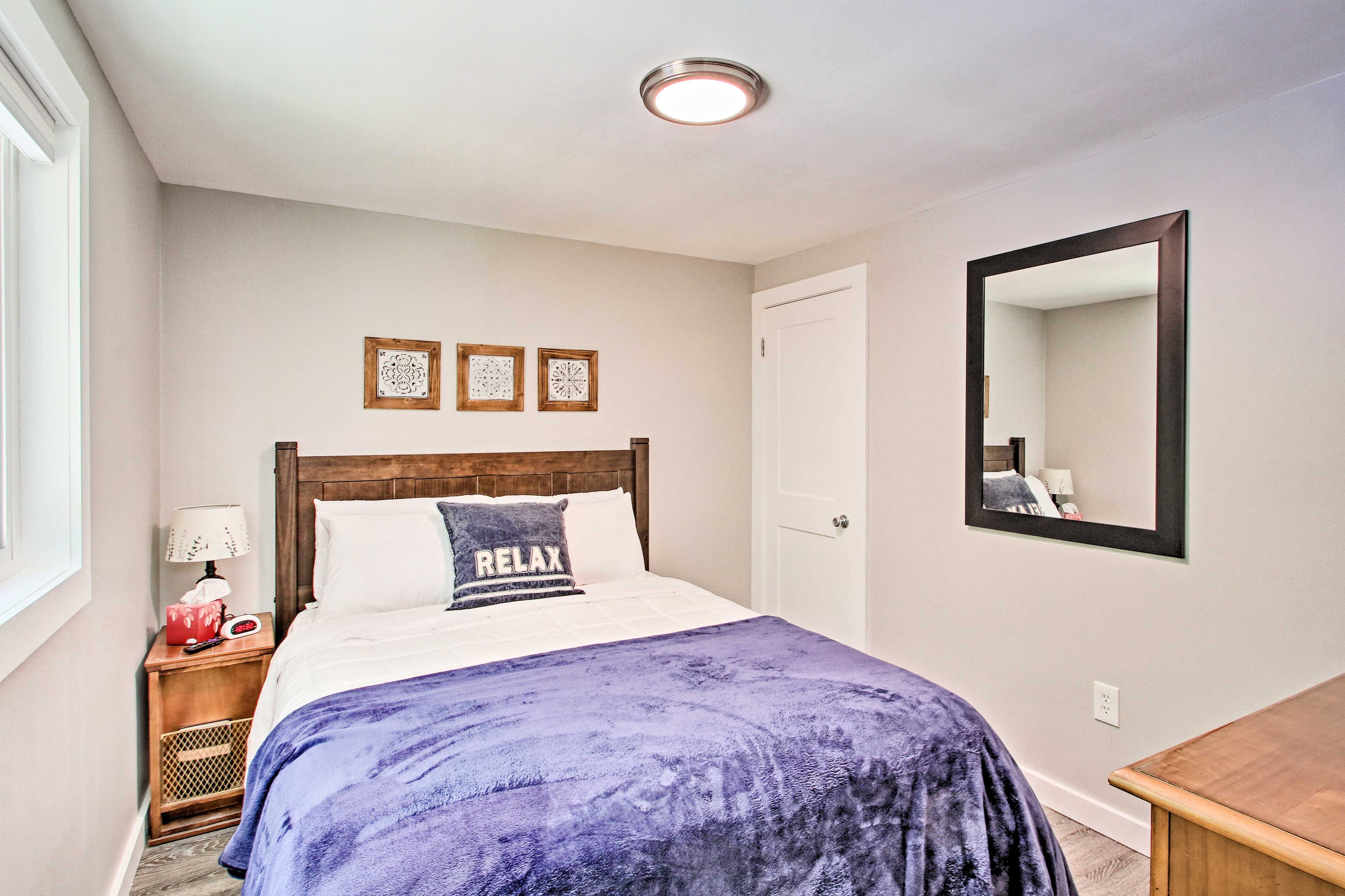 Two travelers can claim the home's lovely first bedroom.