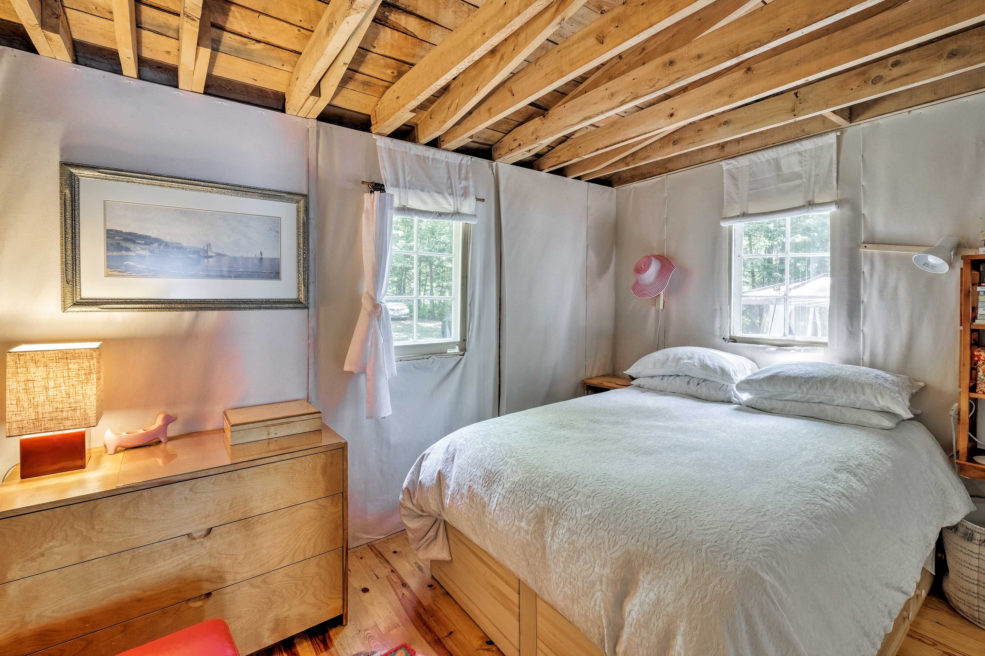 The master bedroom includes a full-sized bed for 2.