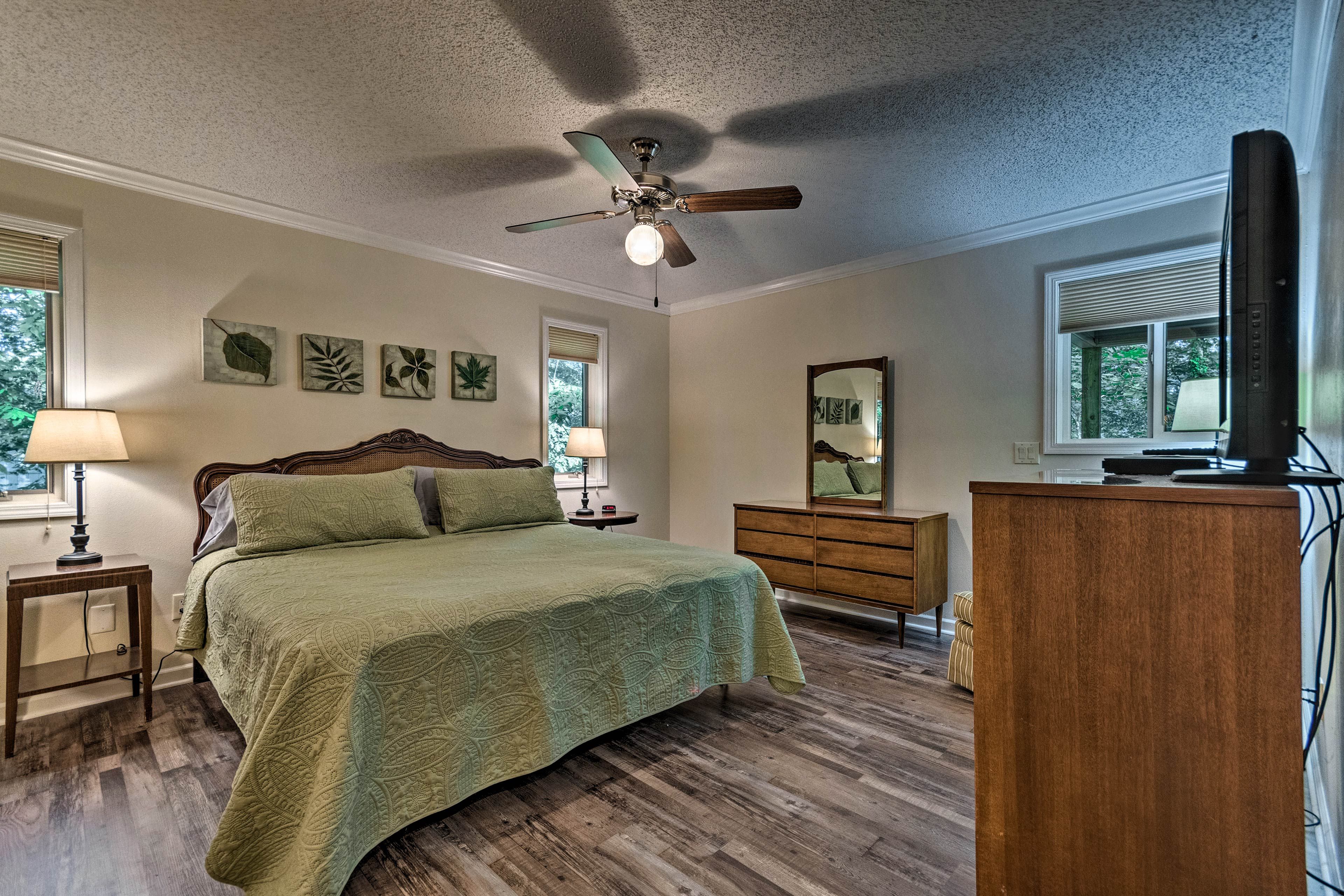 The first bedroom boasts a king-sized bed for 2.