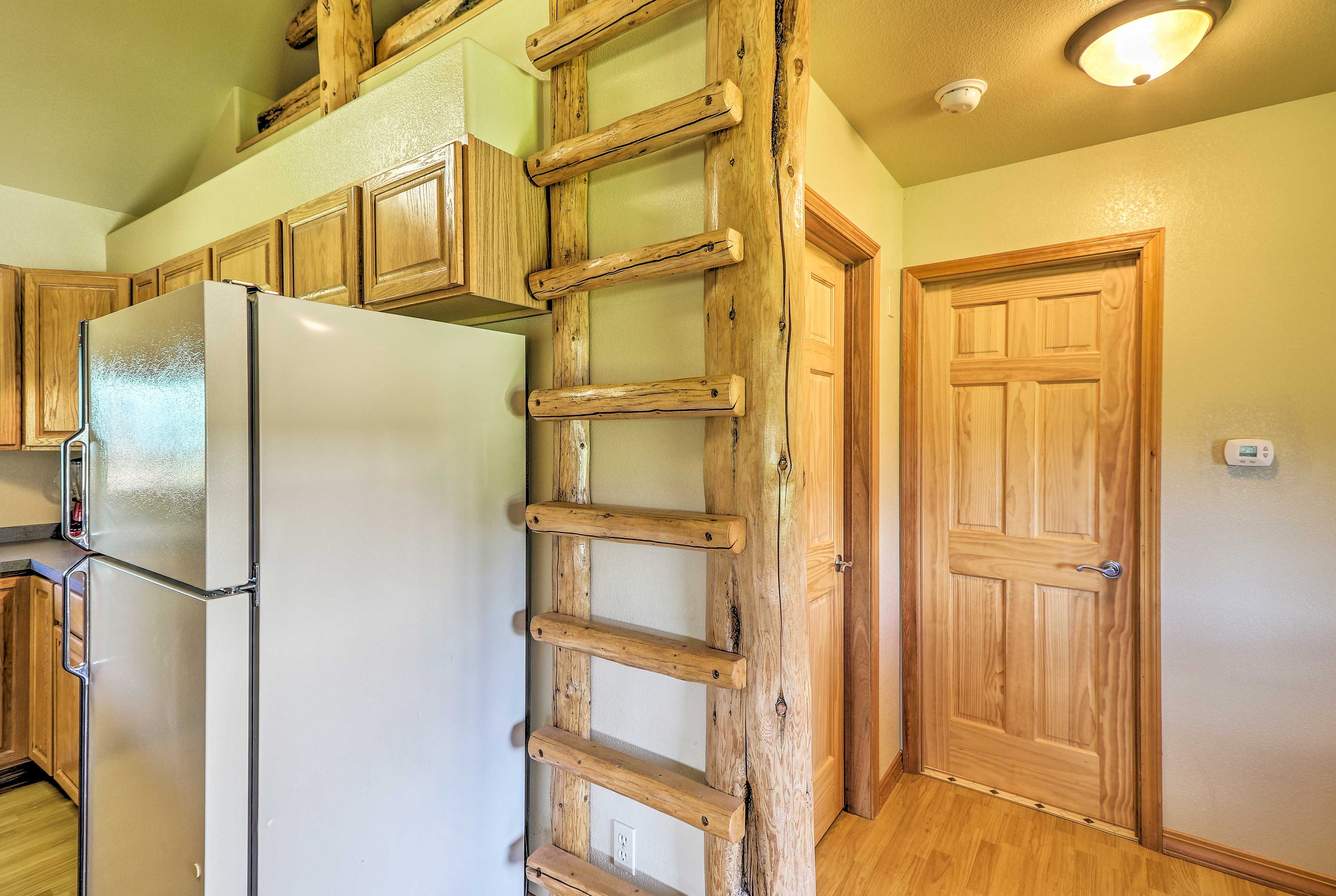 Step up the ladder to access the loft.
