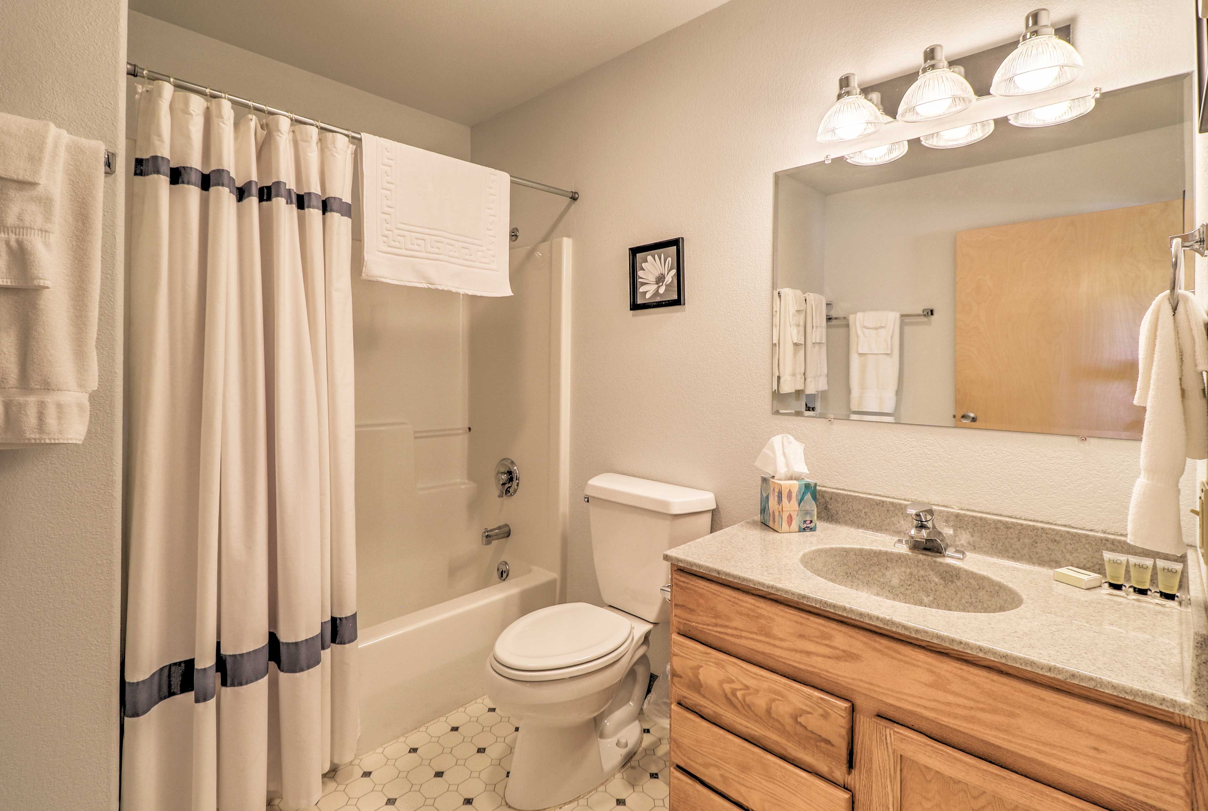 Rinse away the day in the first full bathroom.