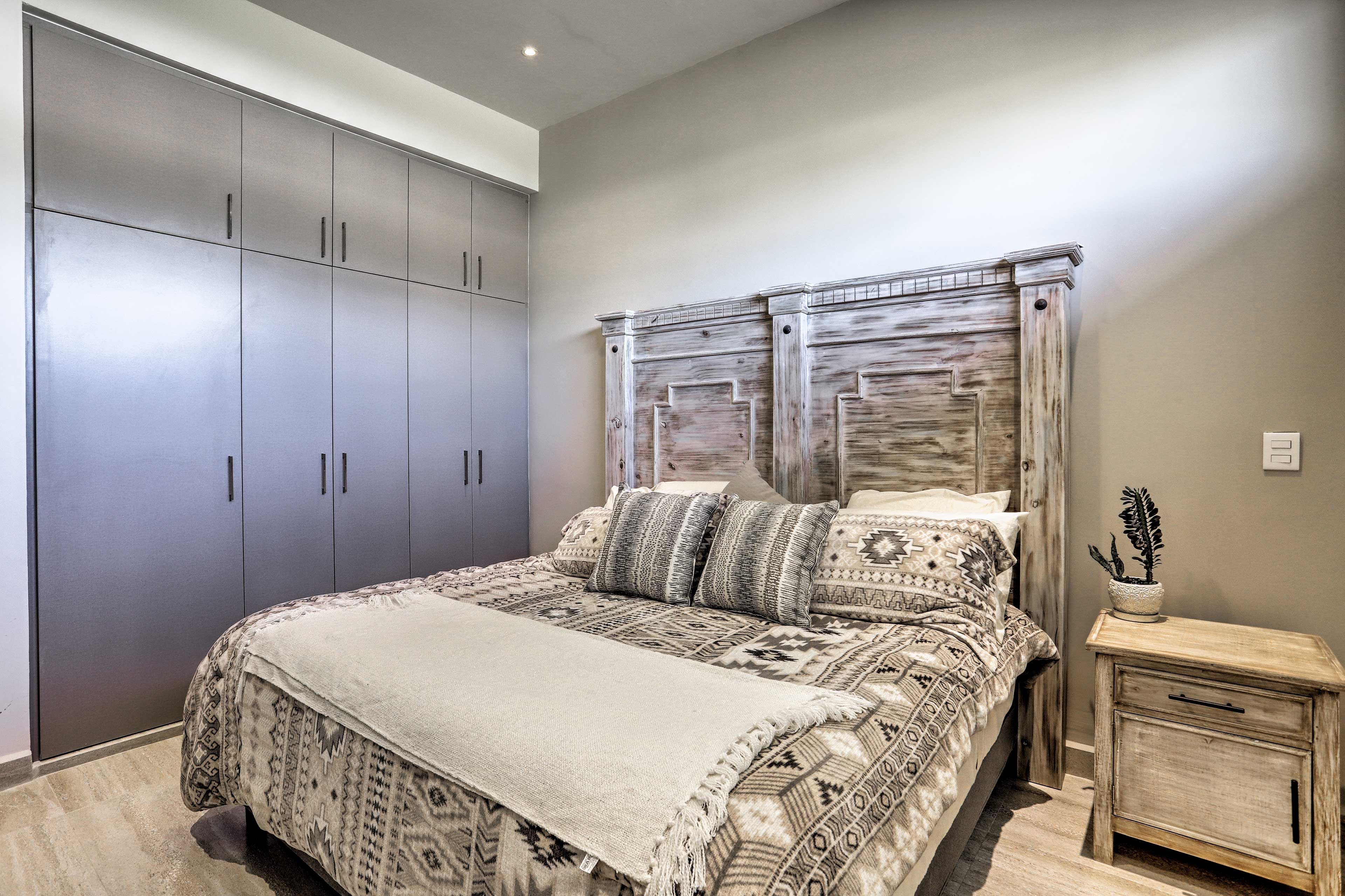 Hide away in this vibrant bedroom for a night of rest.