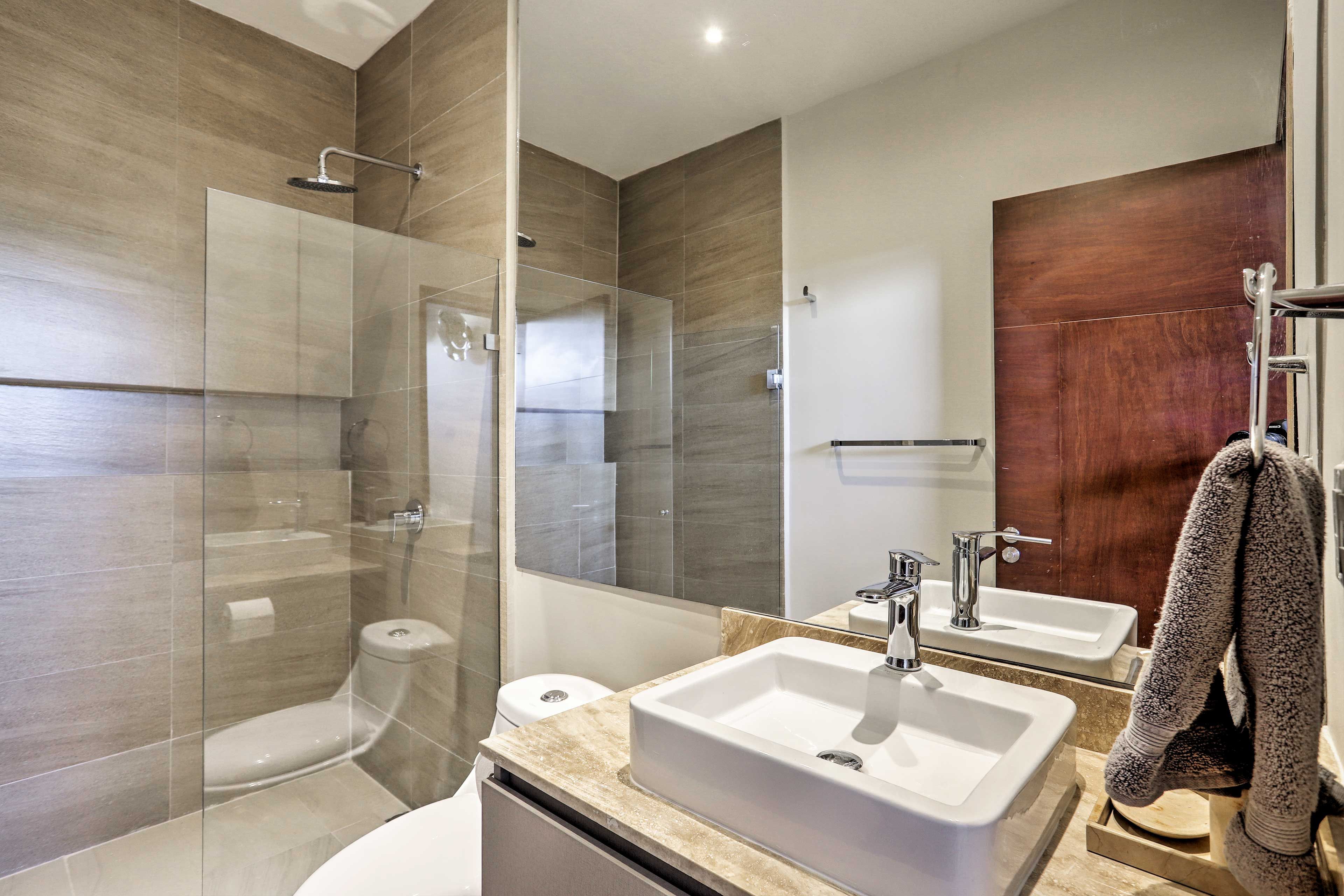 Freshen up in the ensuite bathroom.