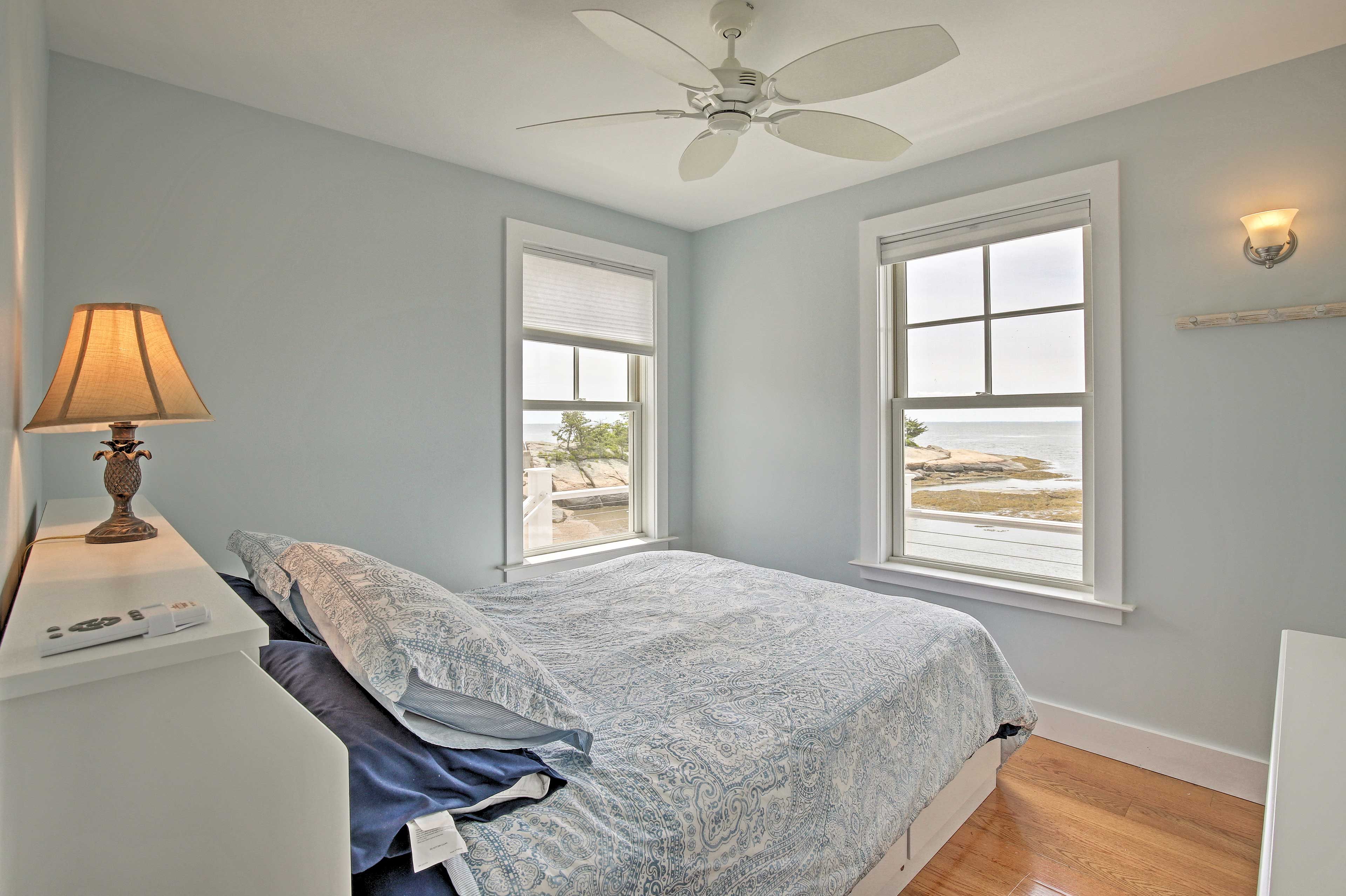 The first bedroom features a queen bed.