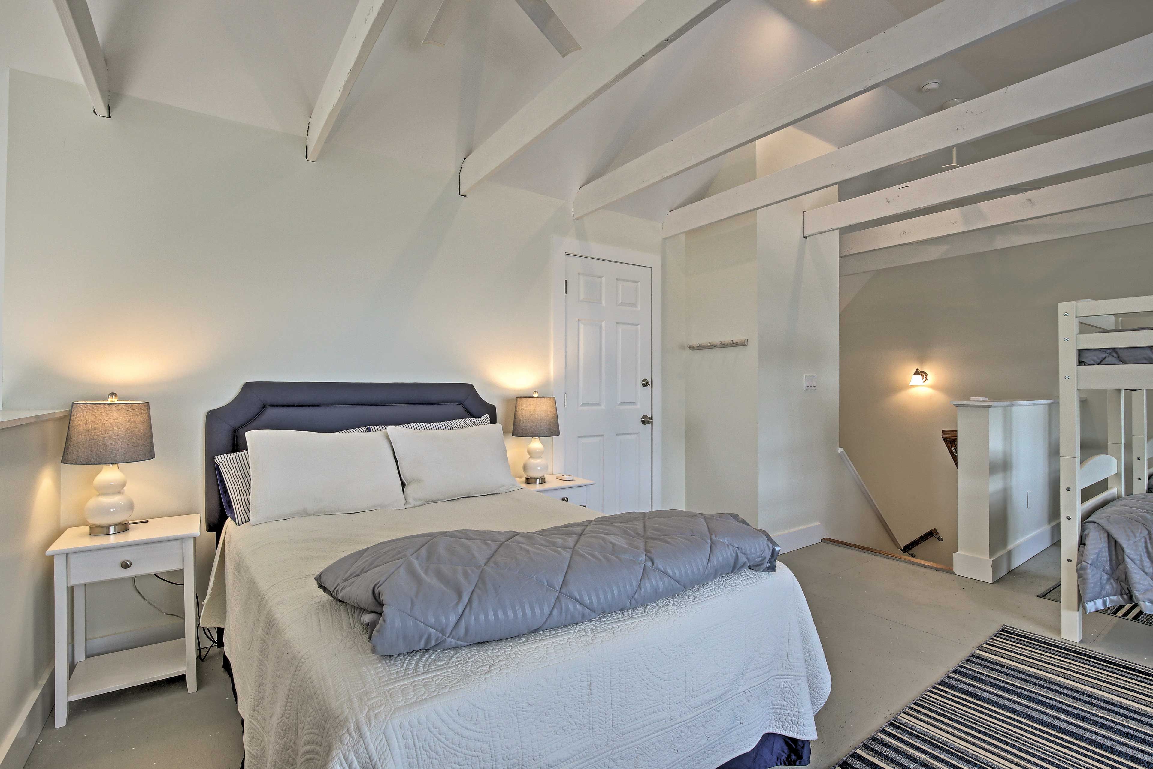 The loft features 2 twin bunk beds and a full bed.