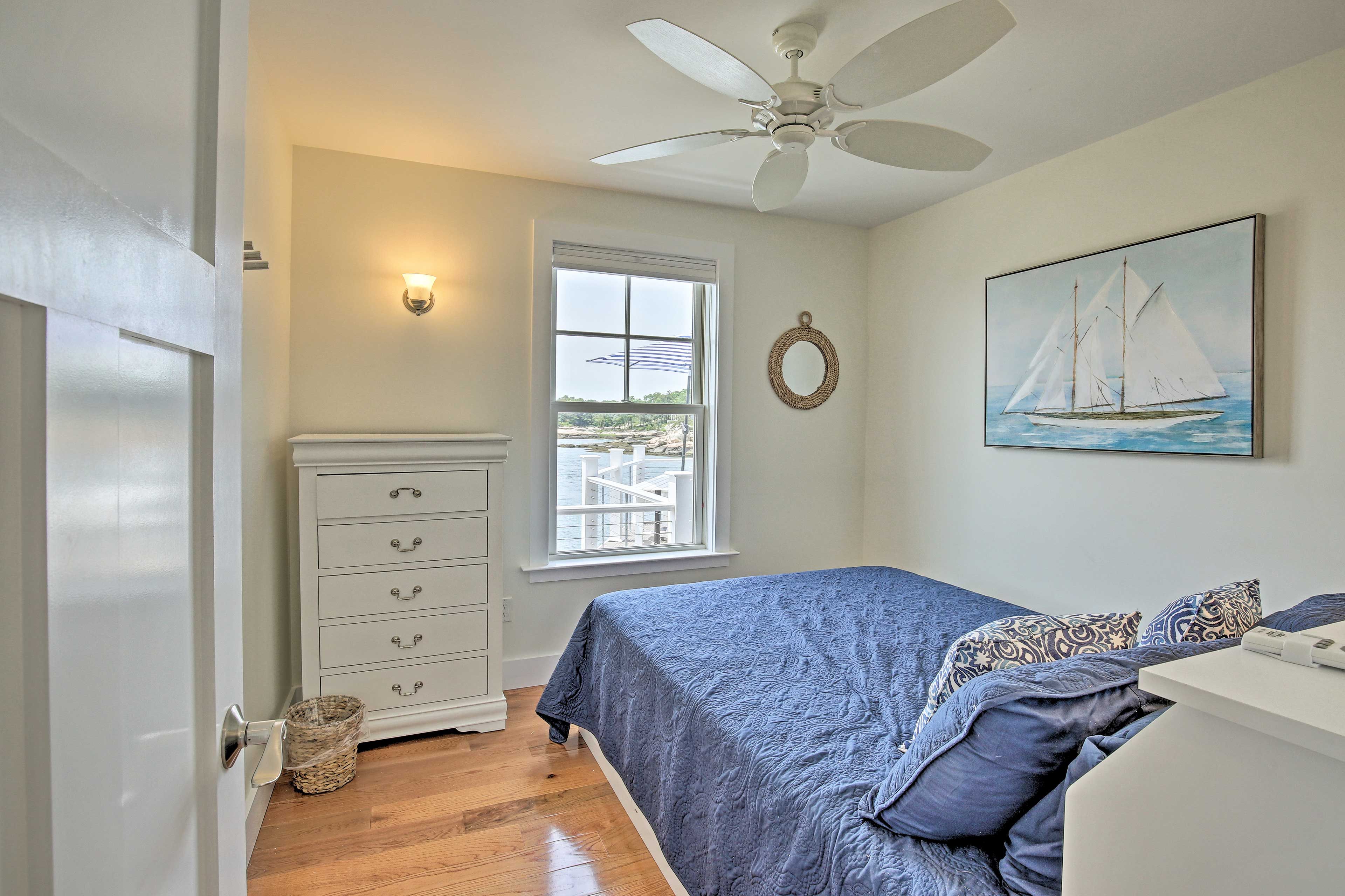 The second bedroom boasts a queen bed as well.