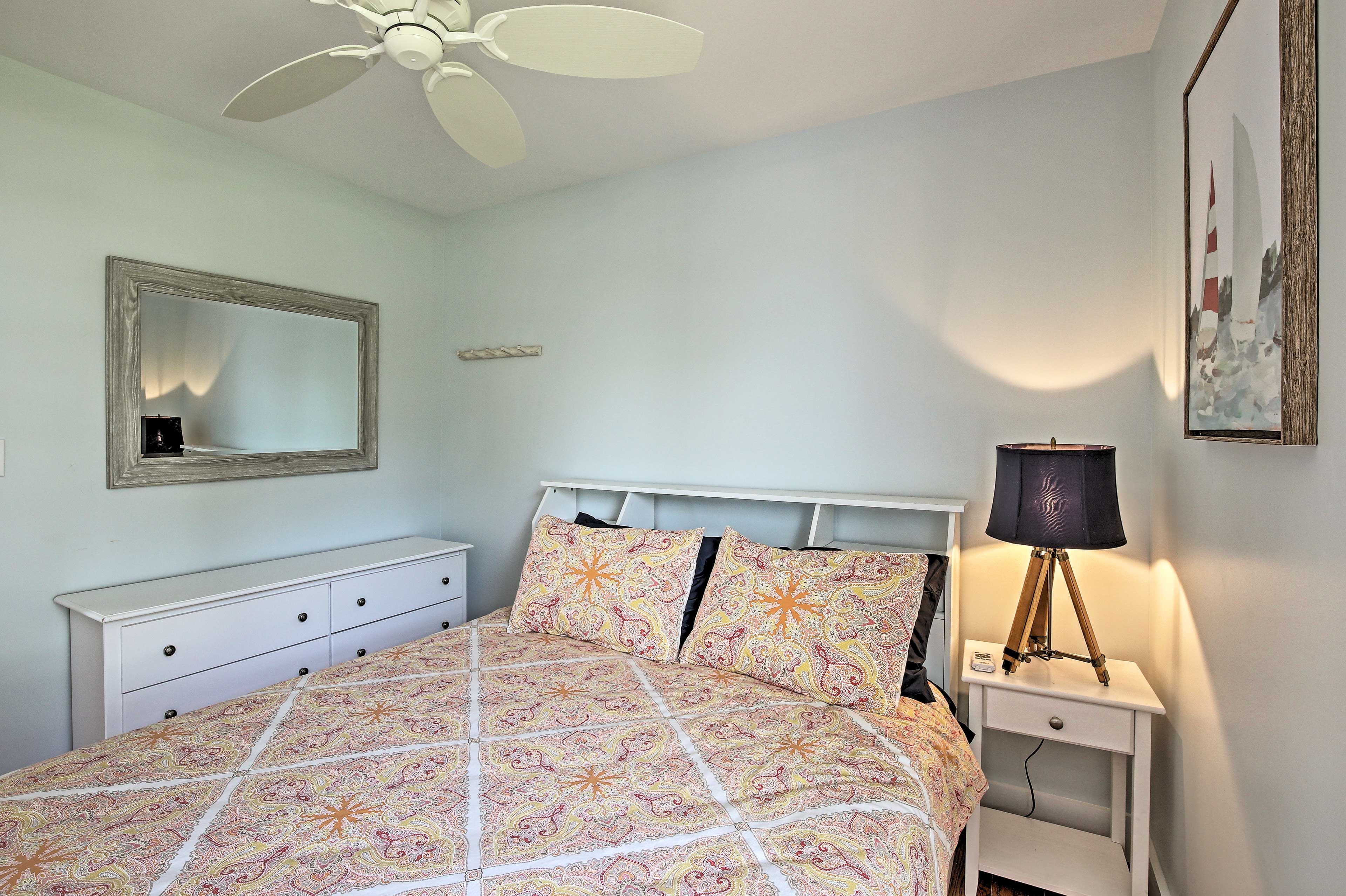 Each bedroom is outfitted with a queen bed.