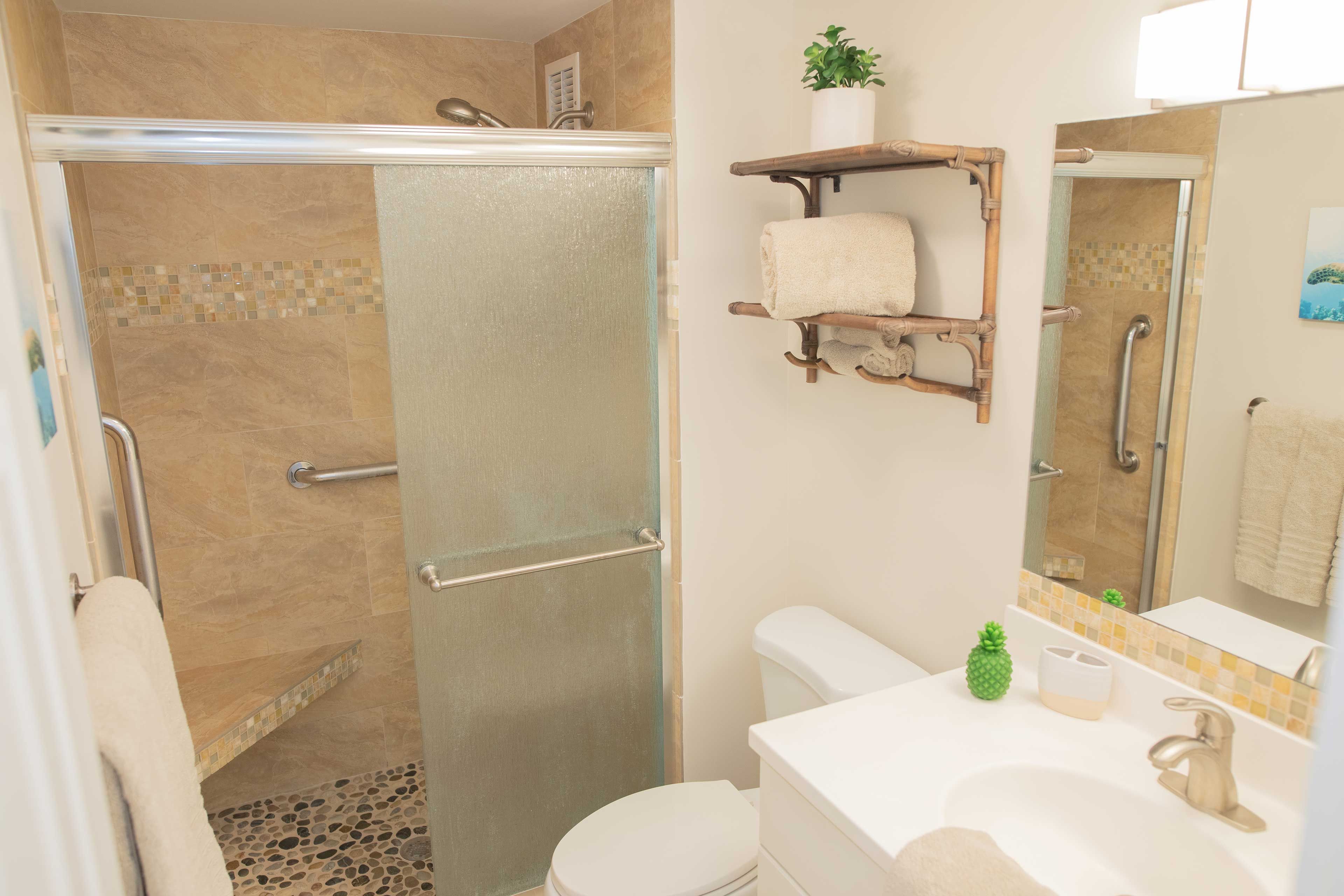 Rinse off any leftover sunscreen in the walk-in shower.