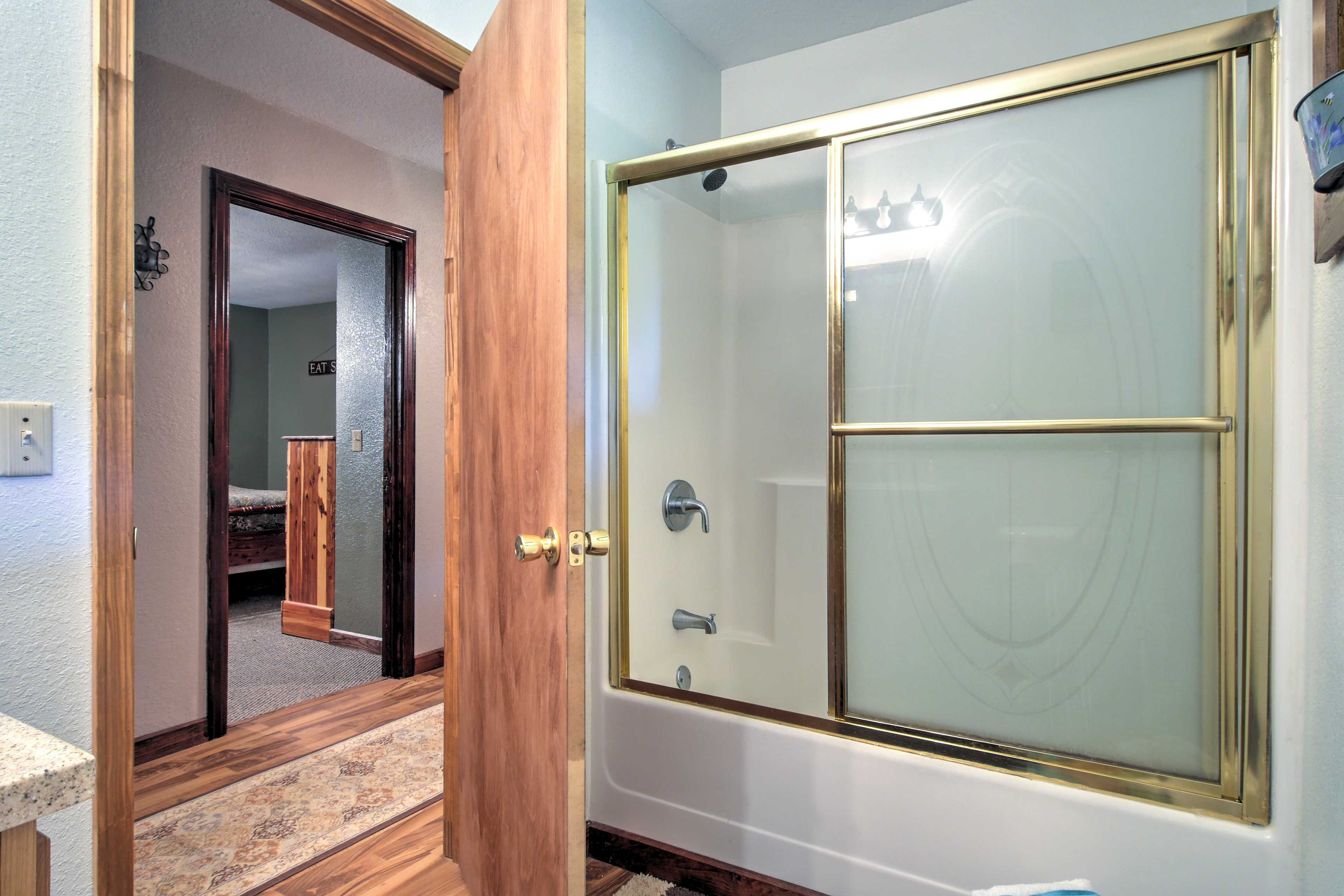 Shower off in the full bathroom after a day outdoors.
