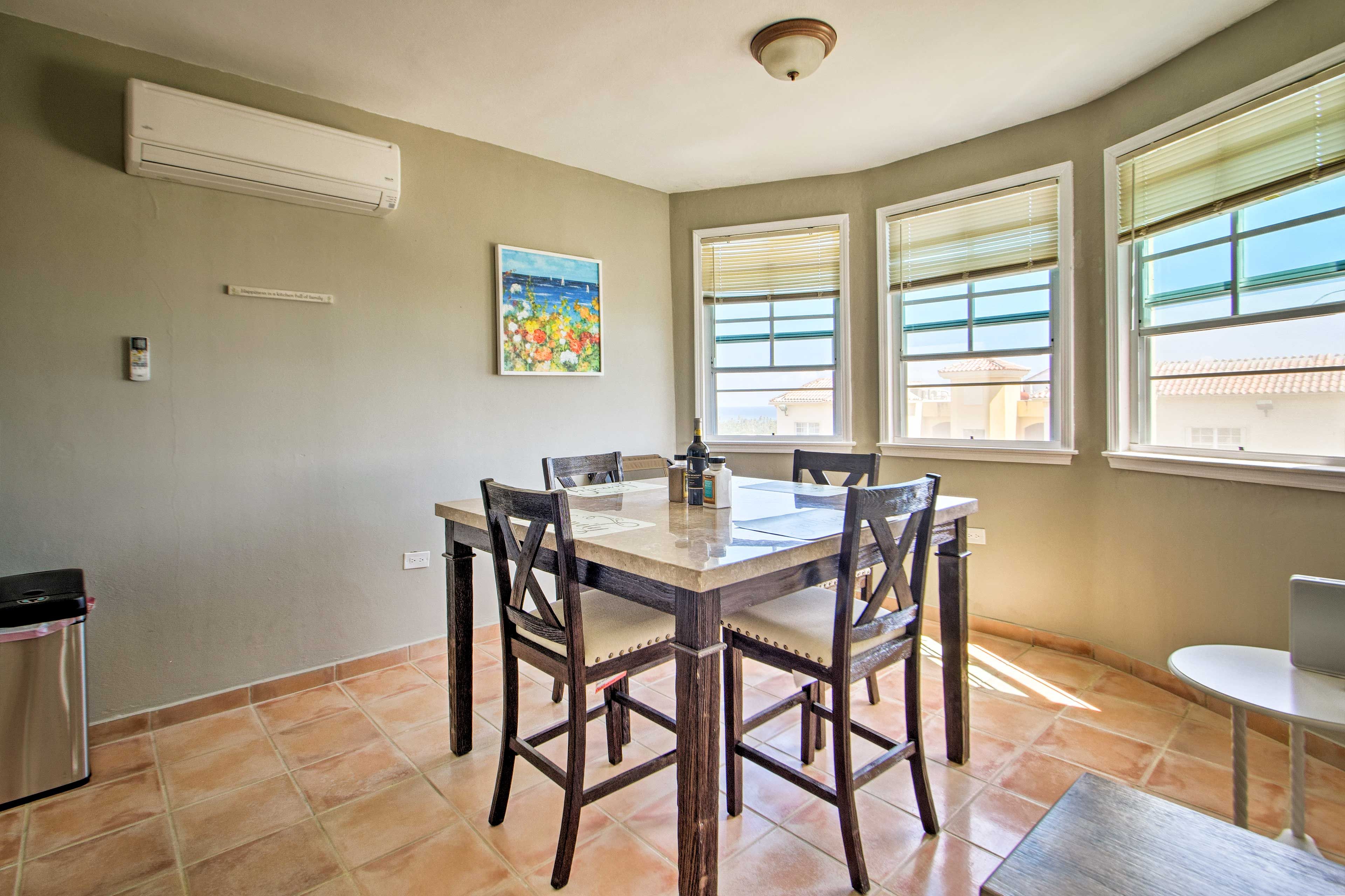 Natural light illuminates the rustic Saltillo floor tiles.
