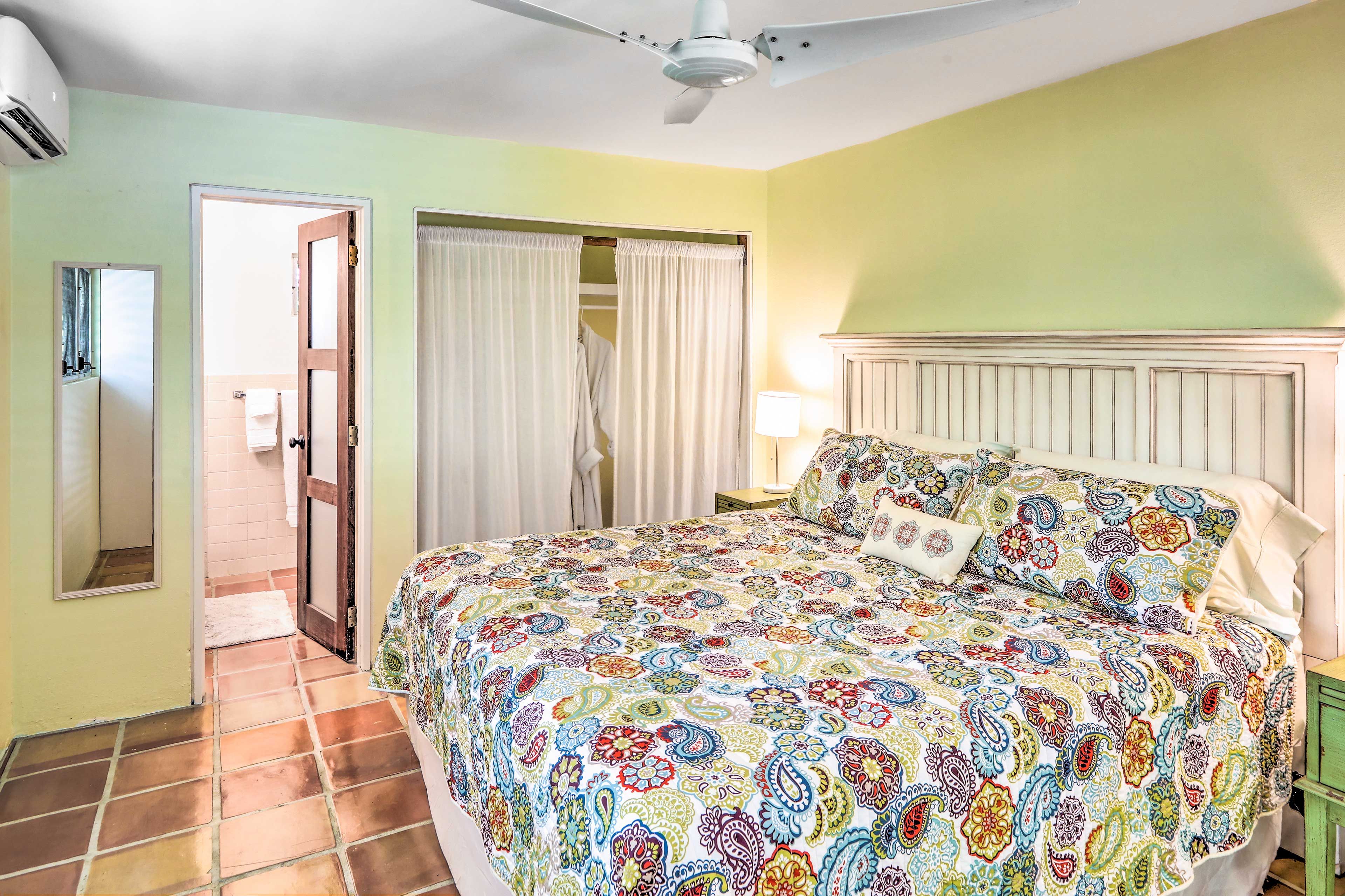 The first bedroom features a king-sized bed.