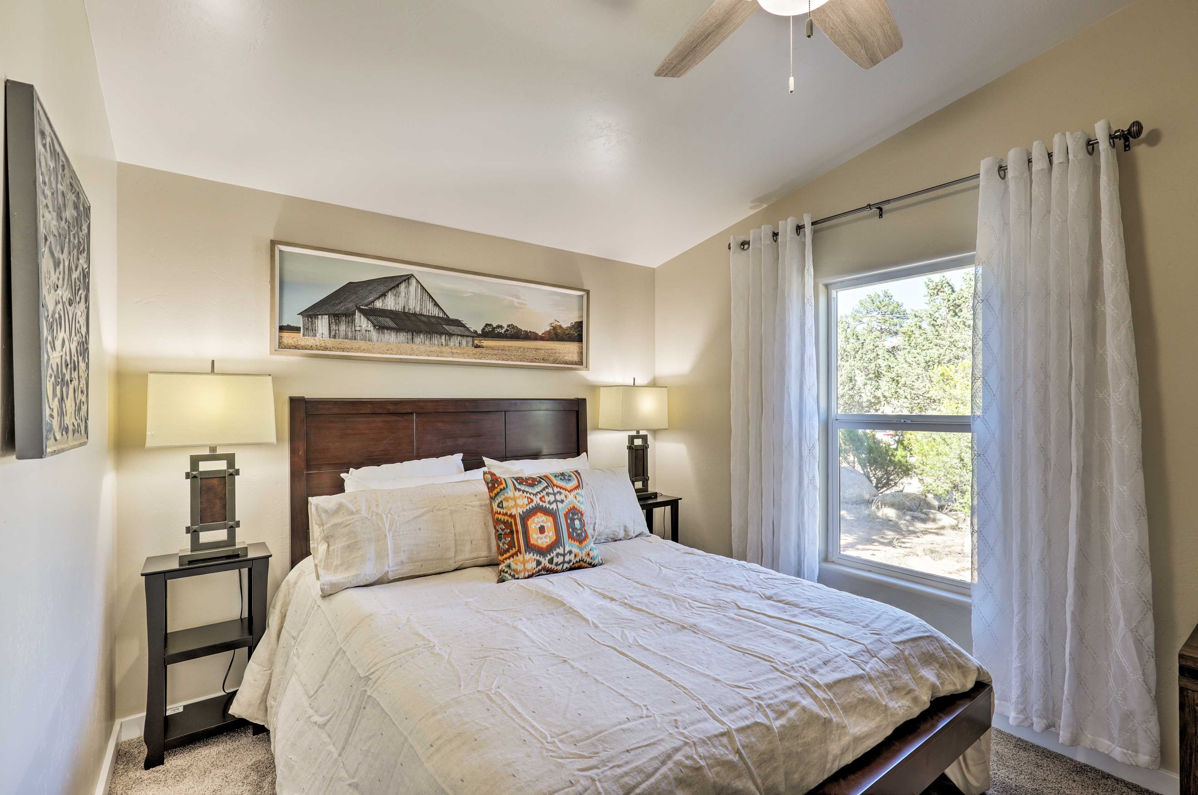 Two additional guests will be more than comfortable in this queen bed.