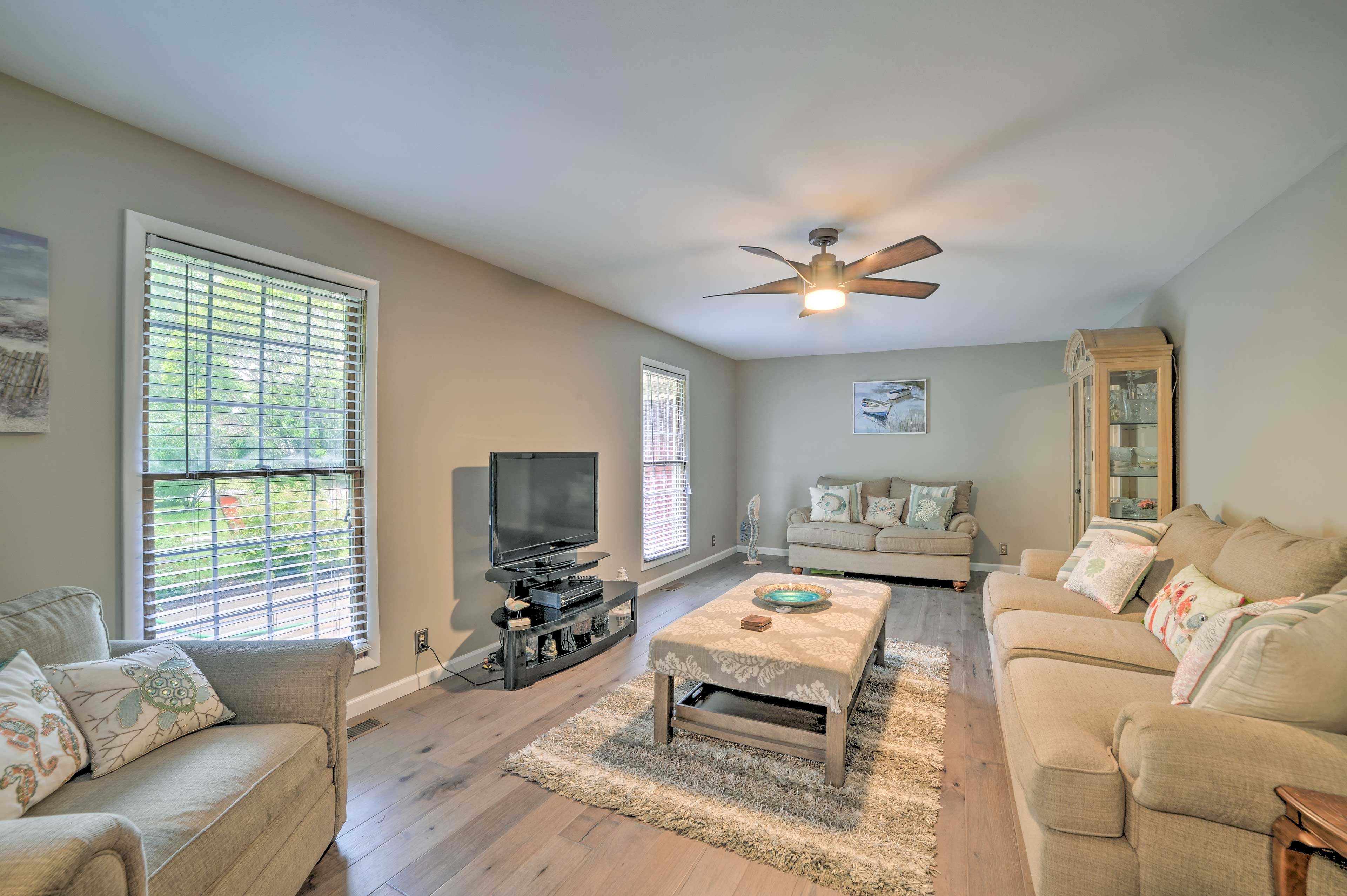 The living room is full of natural light!