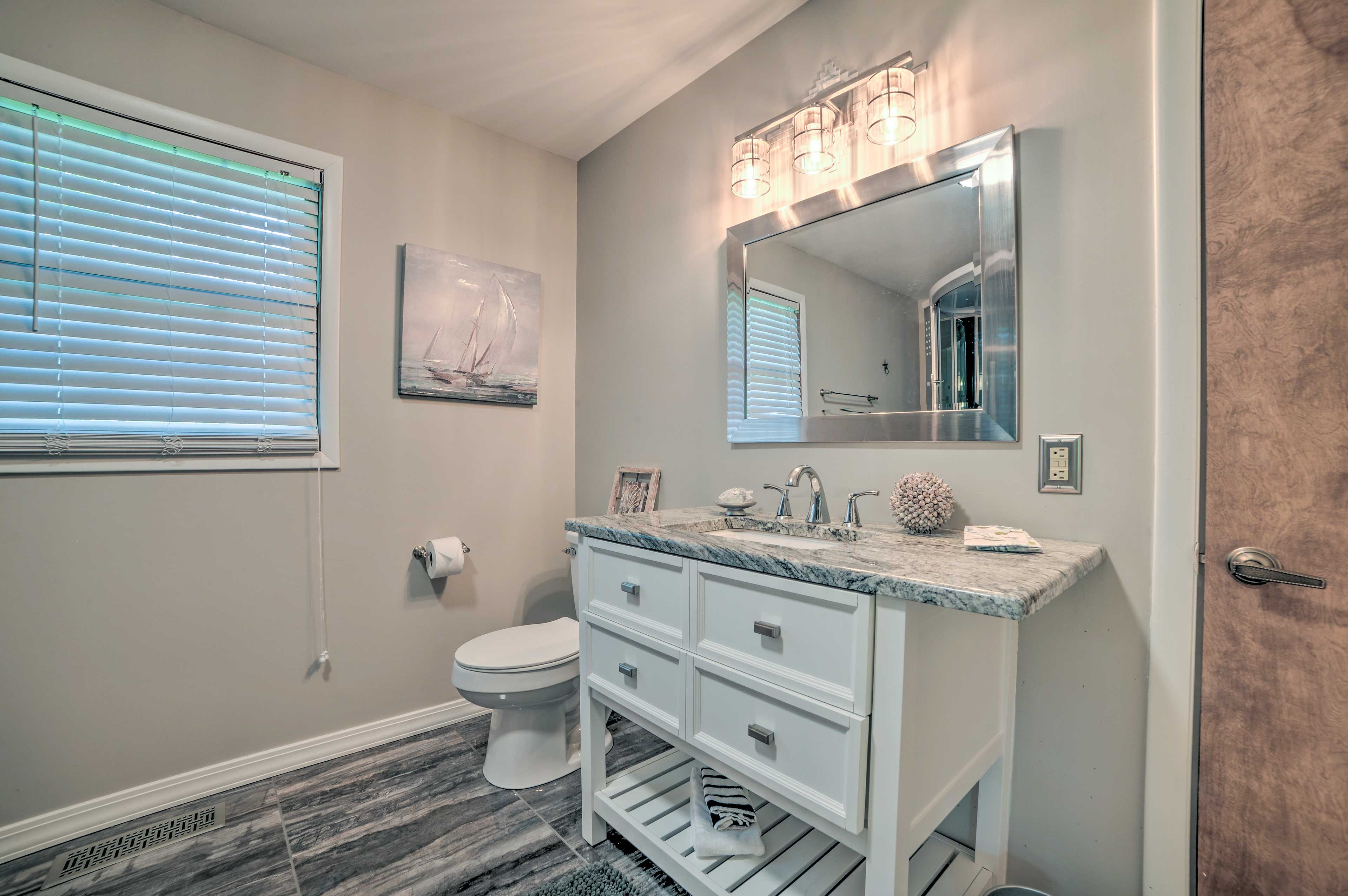 The remodeled en-suite bathroom makes getting ready easy.