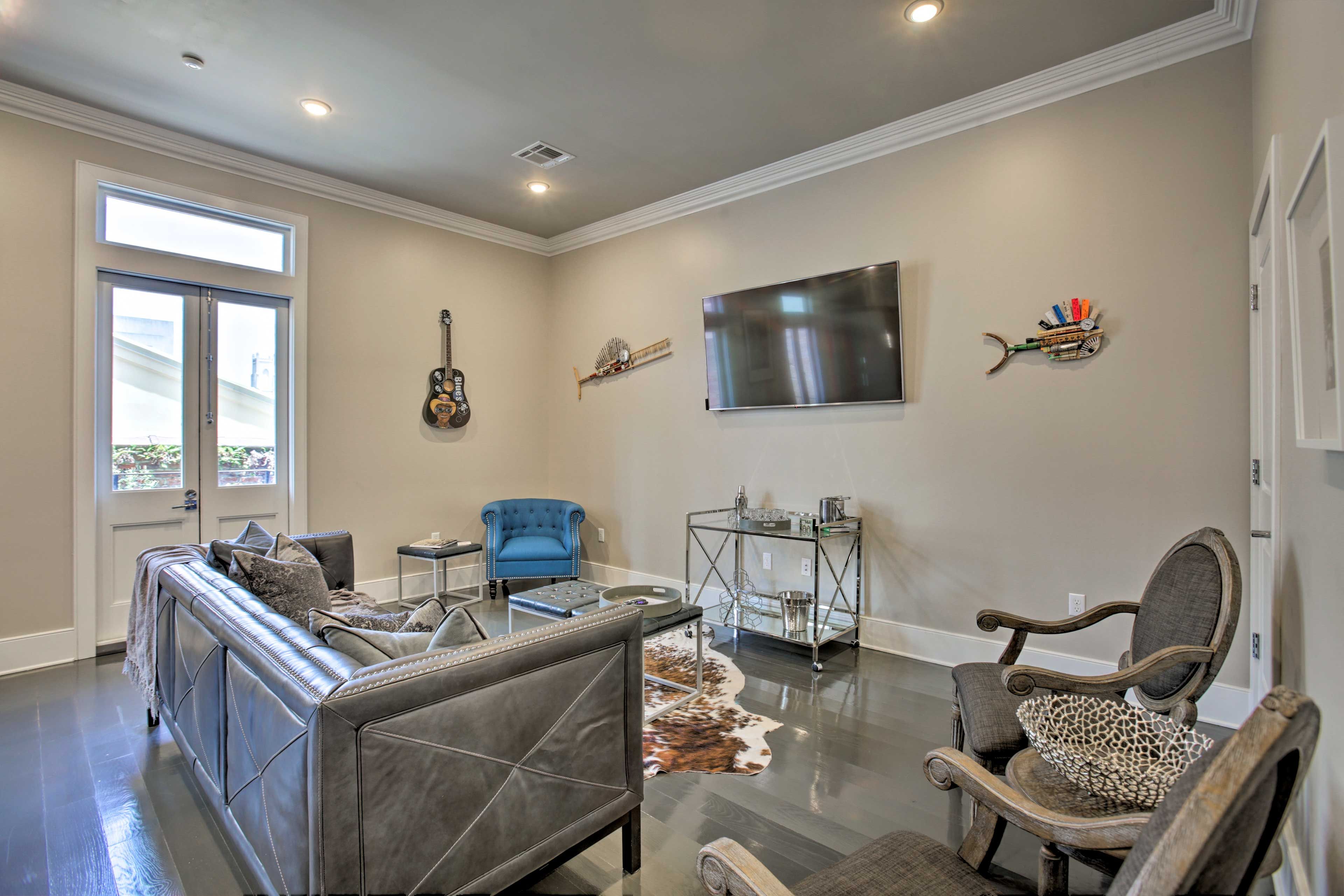 Relax on the sofa and watch a show on the flat-screen TV.