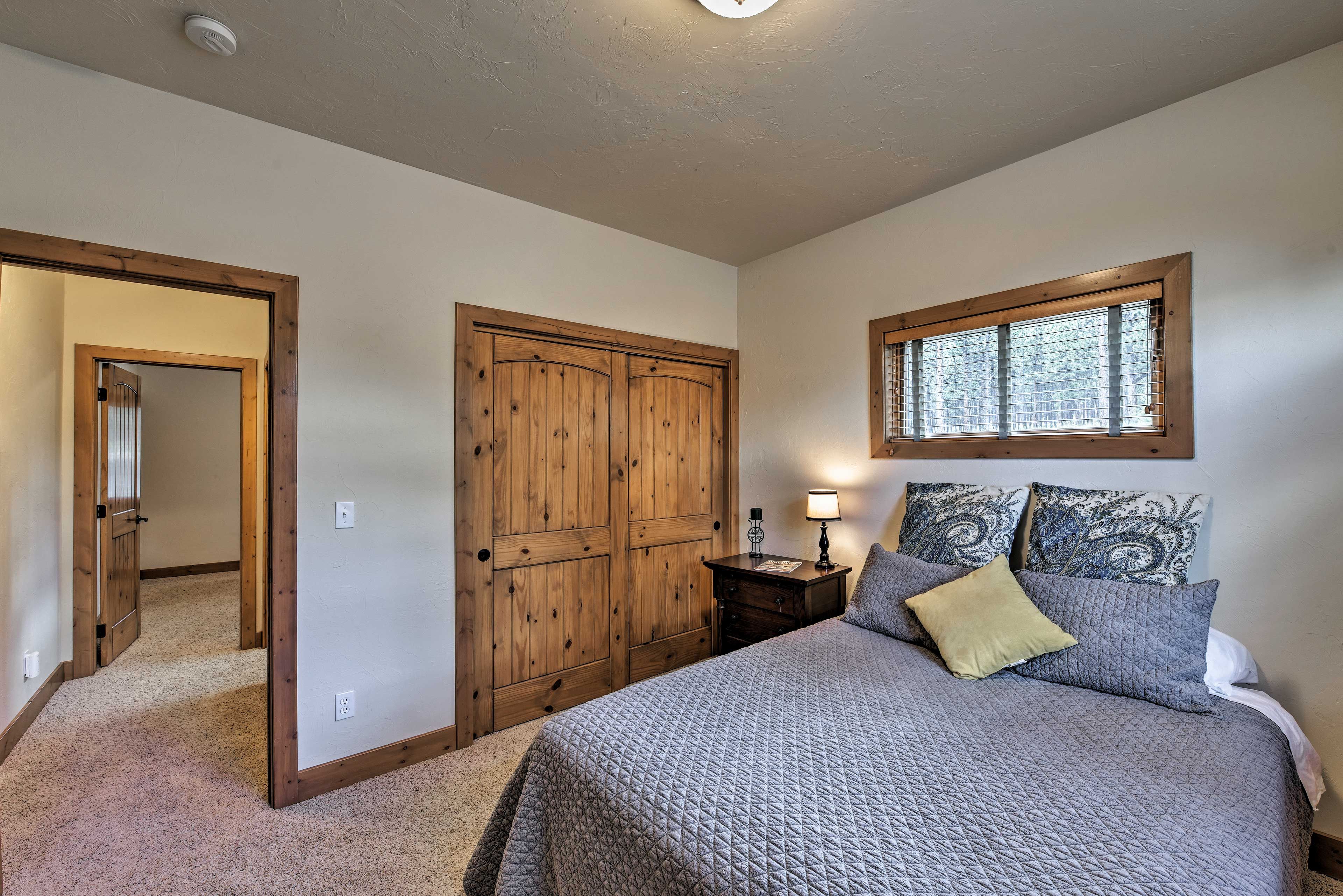 The second bedroom features a queen bed.