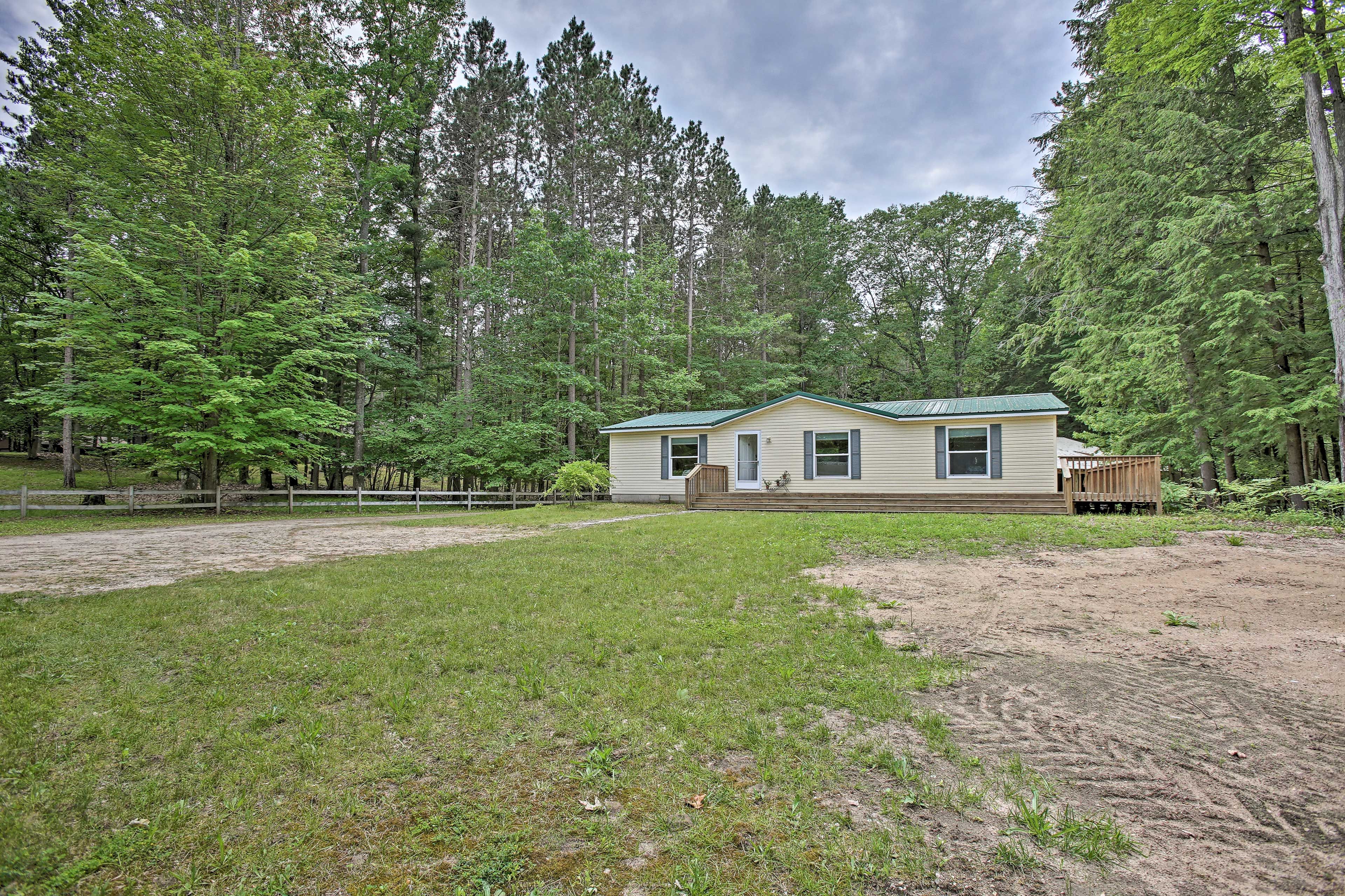 The peaceful property is set back from the road for privacy.