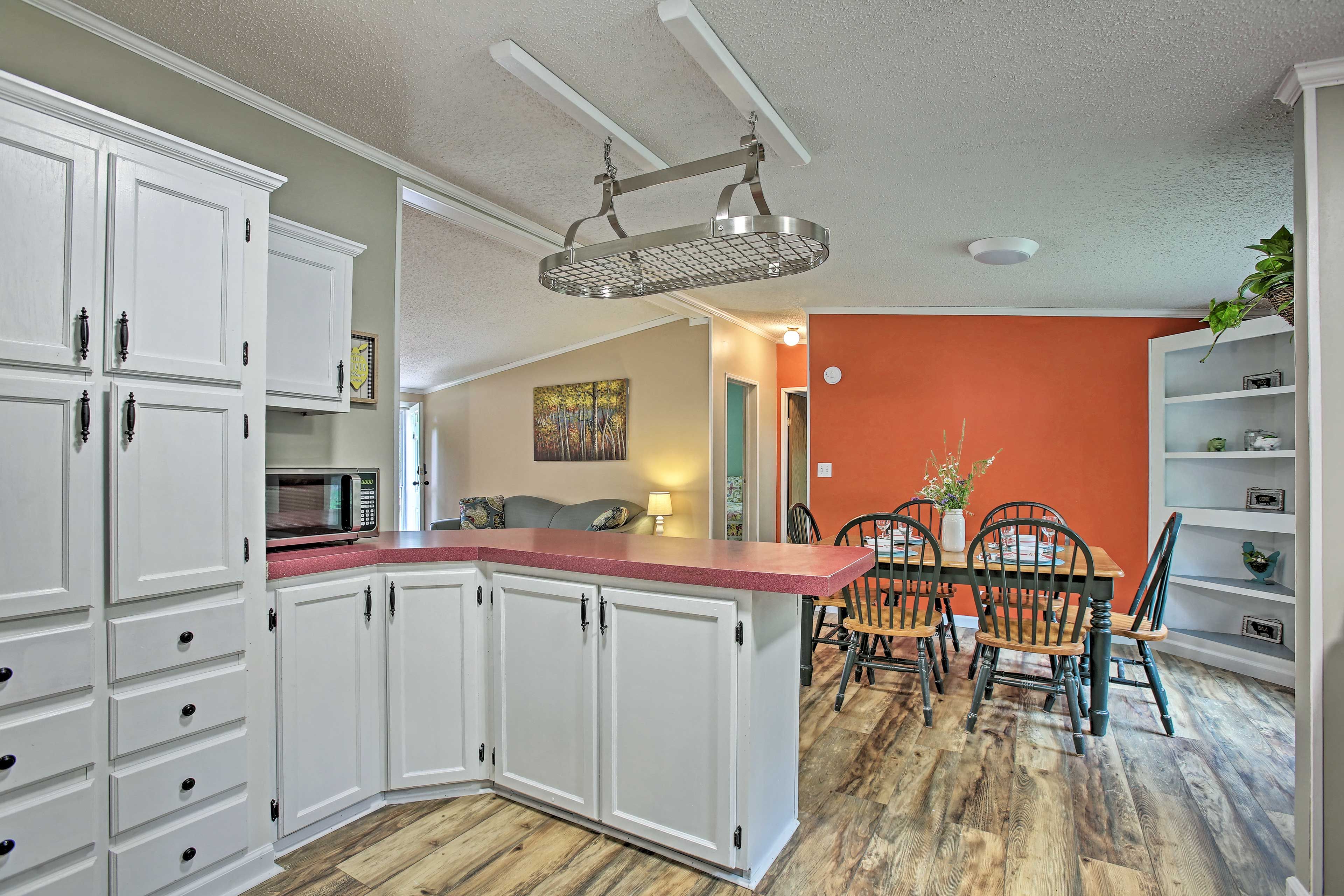The cabinets offer plenty of storage for all of your cooking supplies!