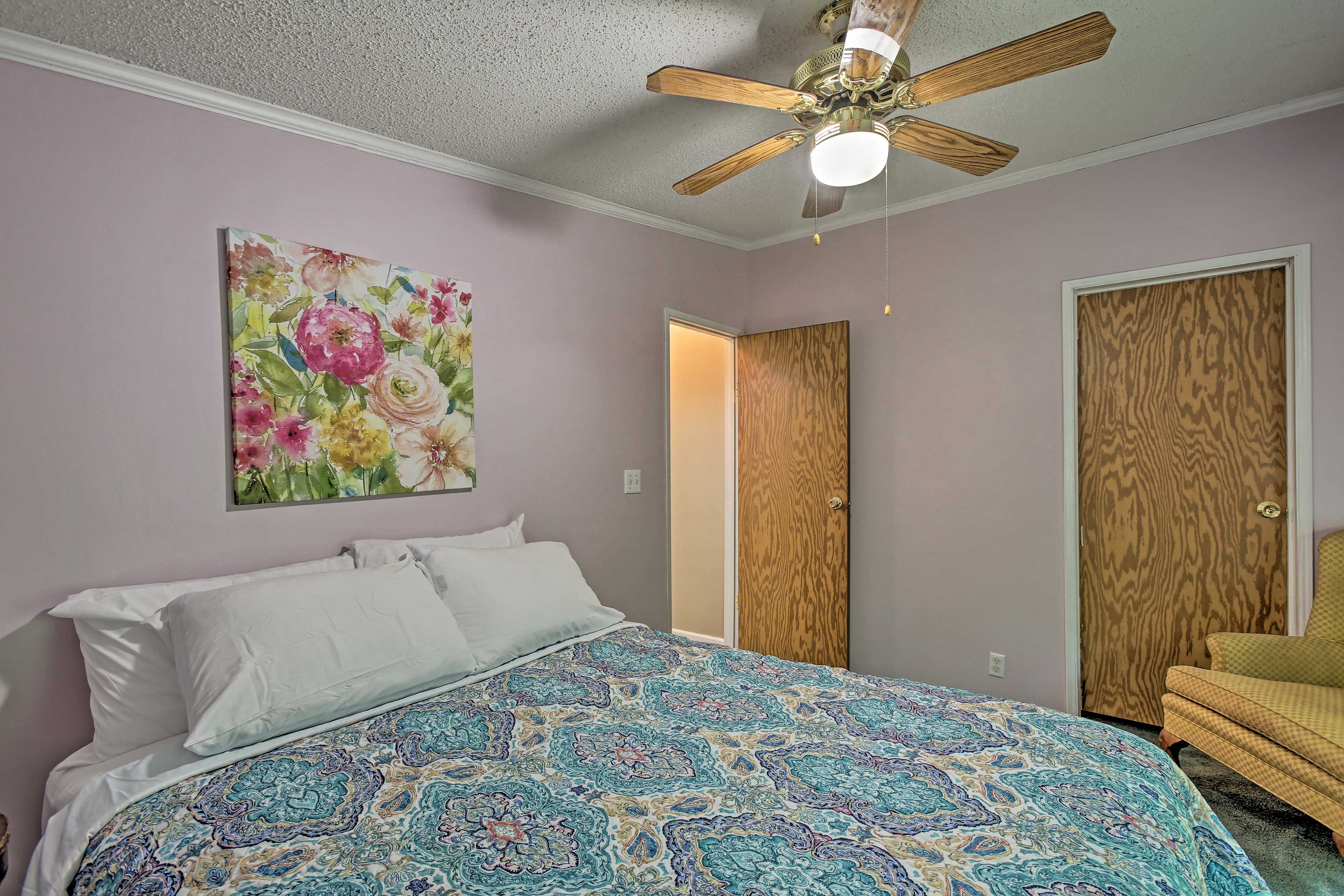 Flip on the ceiling fan to stay comfortable while you rest in the queen bed.
