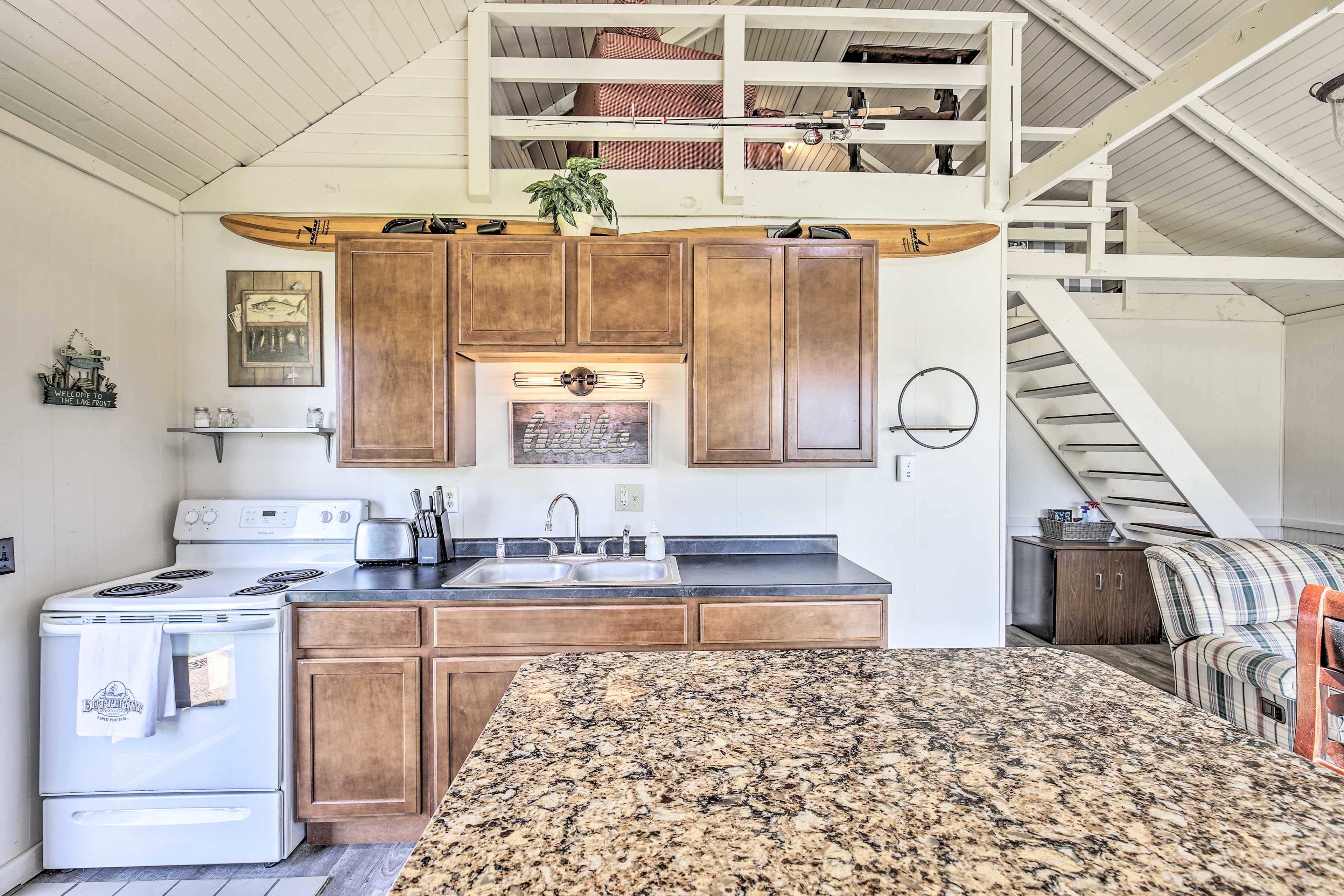 The kitchen comes with all the essentials for home cooking.