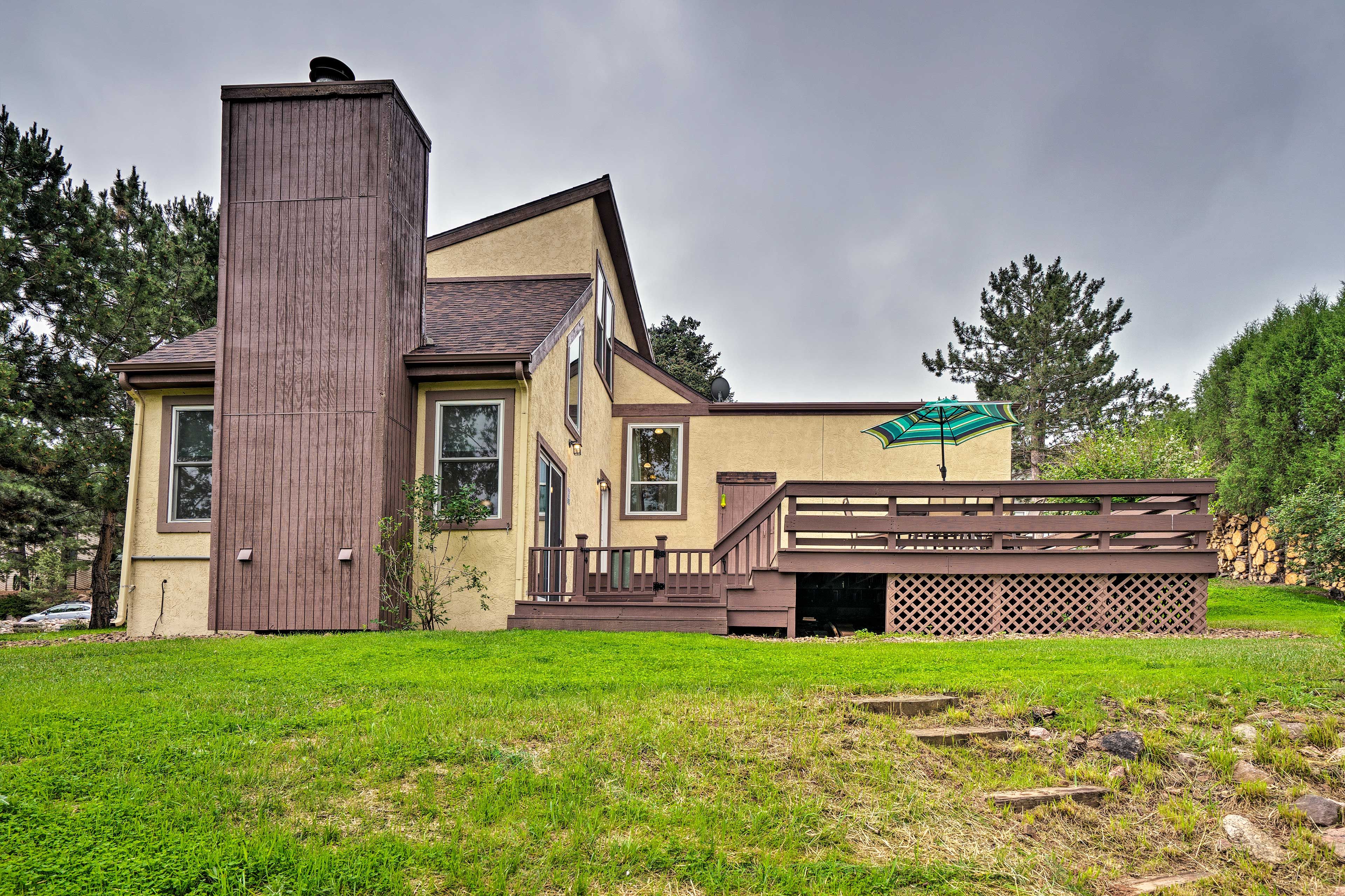 Exterior | Spacious Deck | Hiking Nearby