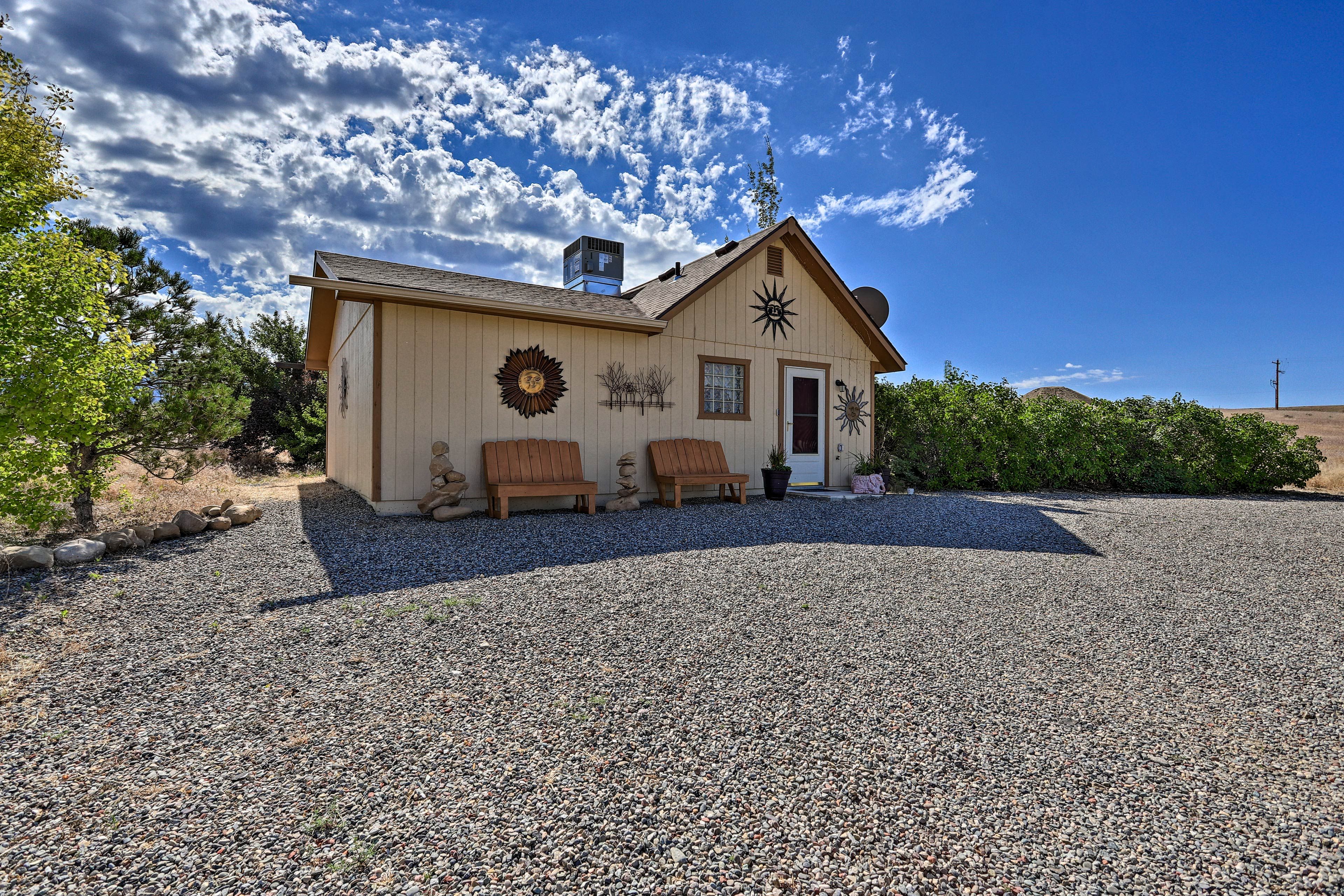 Easily park several vehicles in the spacious driveway.
