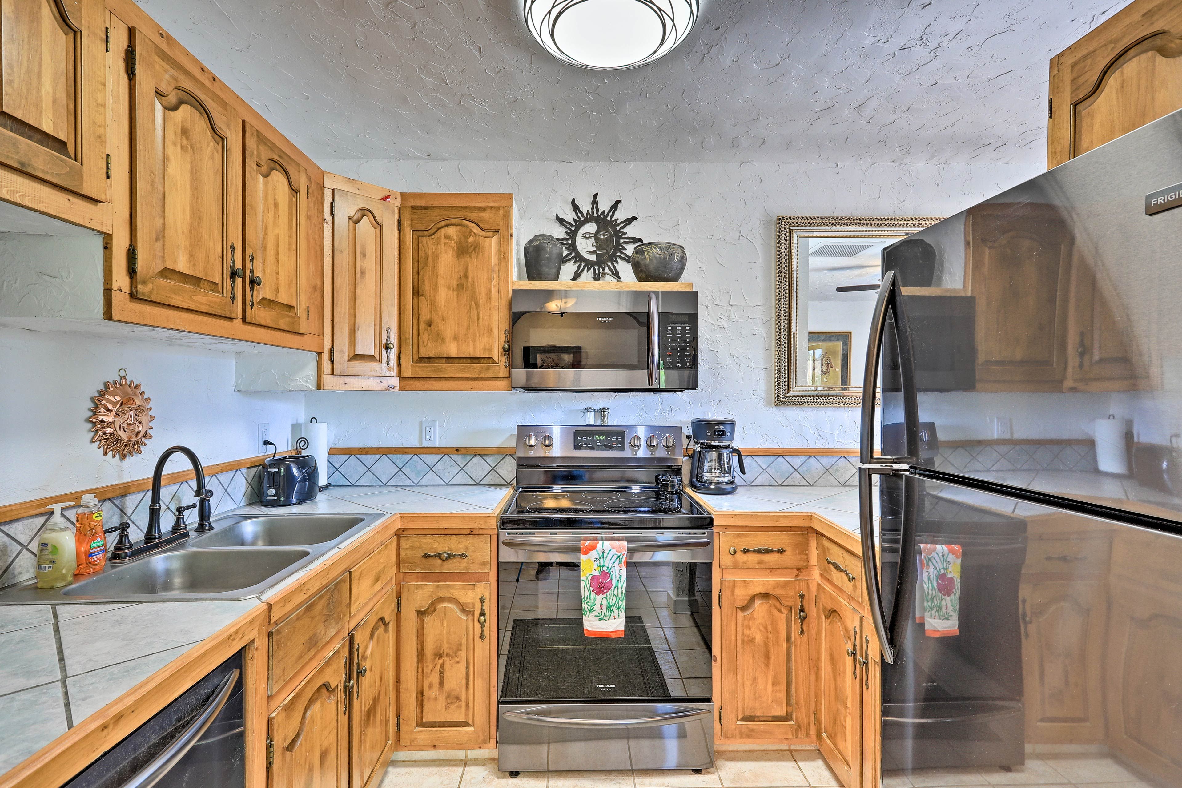 The kitchen comes fully equipped to handle all of your home-cooking needs.