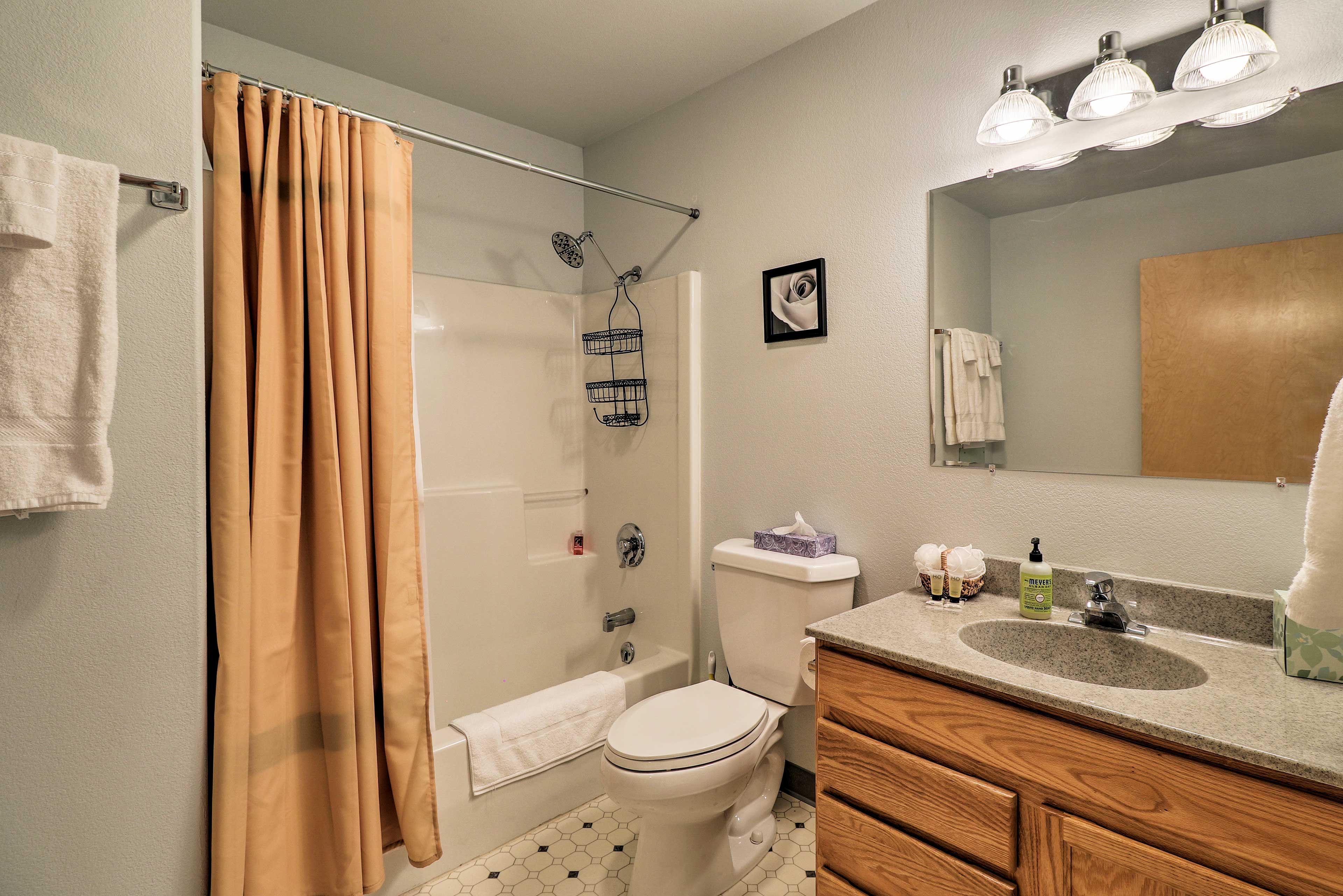 Wash away the day in the shower/tub combo.