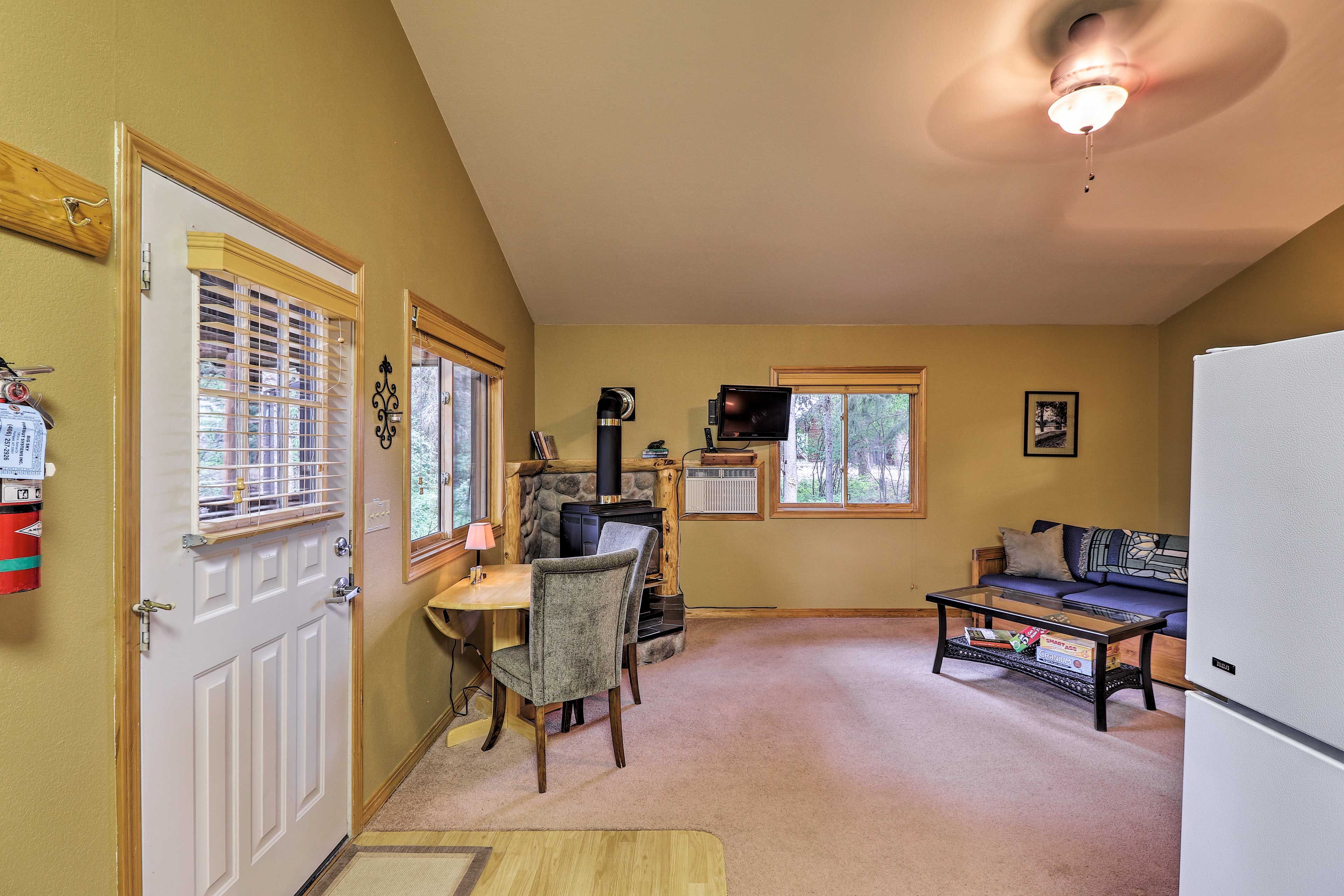 Gather around the small dining table for delicious meals.